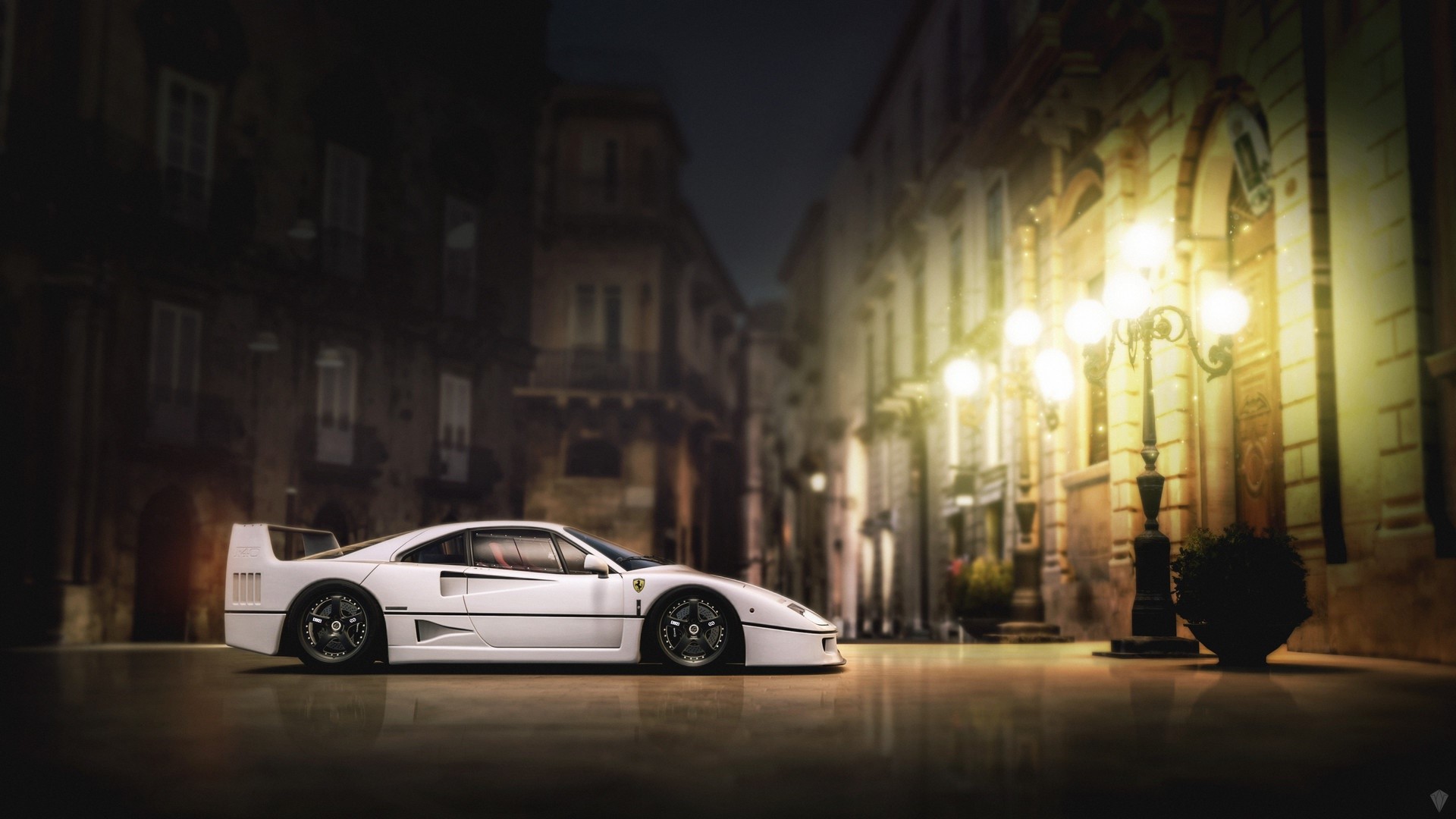 White Ferrari F40 parked on a European street at night HD Wallpaper