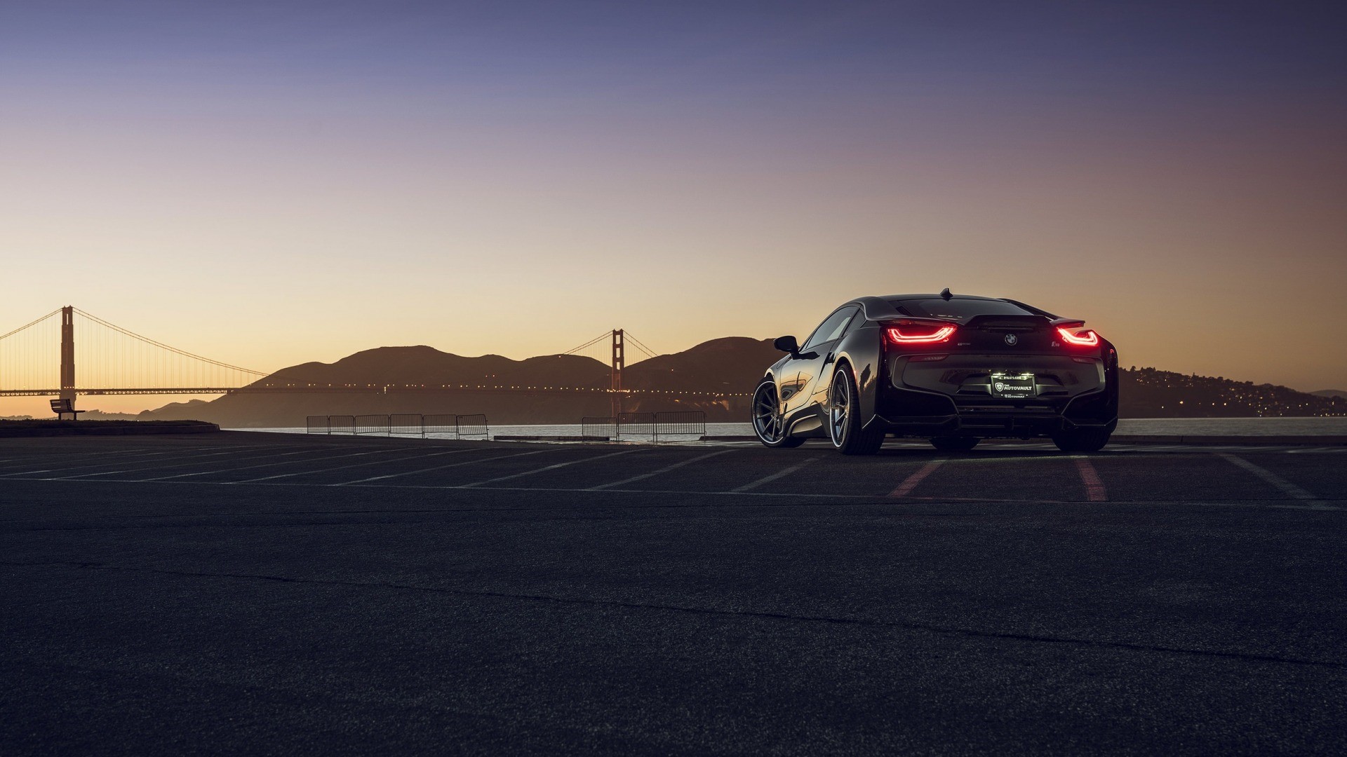BMW i8 parked with Golden Gate Bridge at sunset HD Wallpaper