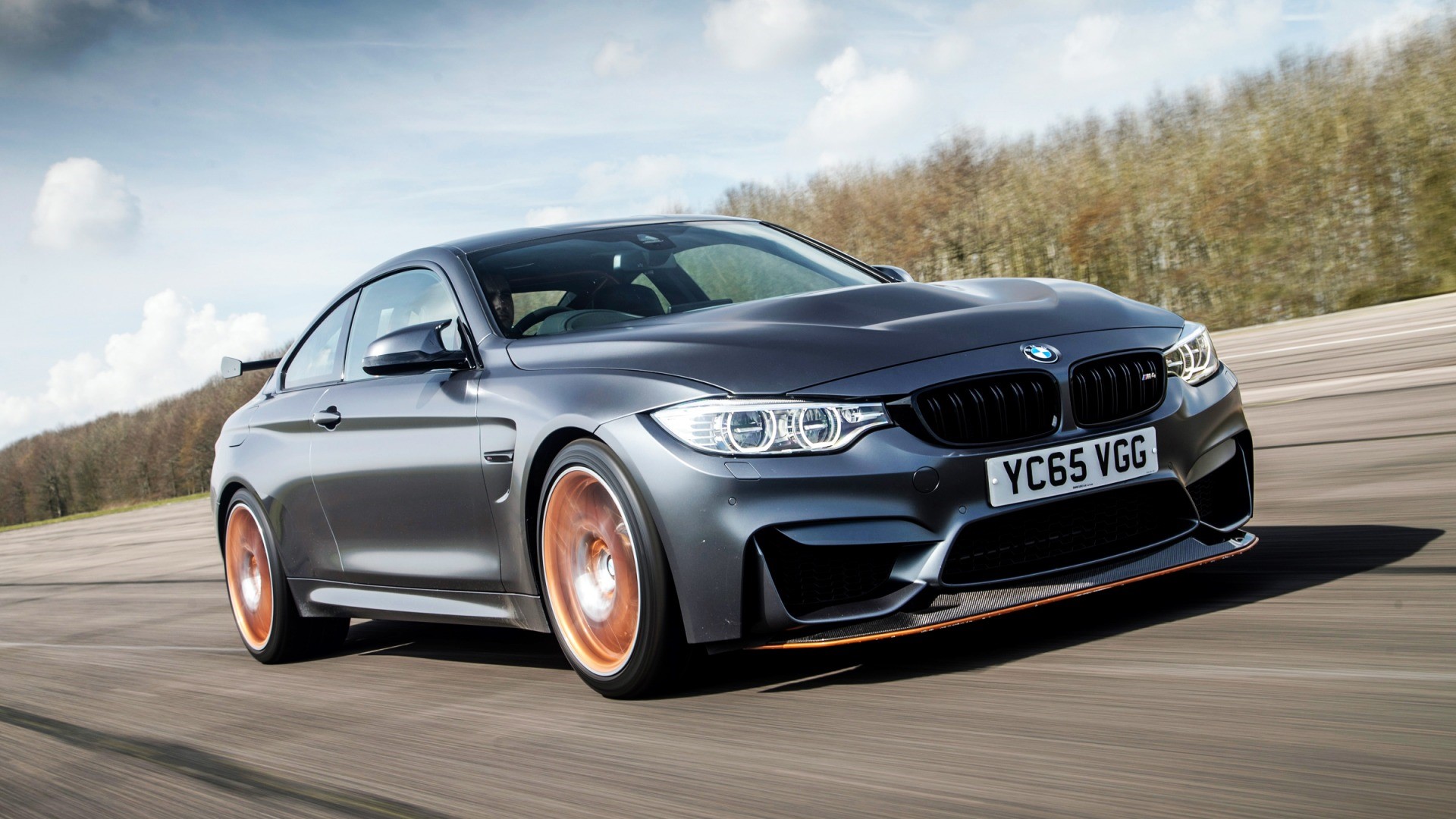 BMW M4 Coupe with Copper Wheels on Road HD Wallpaper