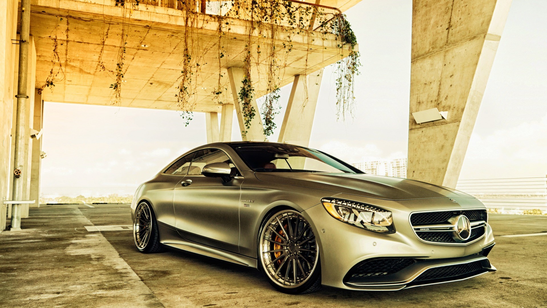 Silver Mercedes-Benz S-Class Coupe parked under a concrete structure HD Wallpaper