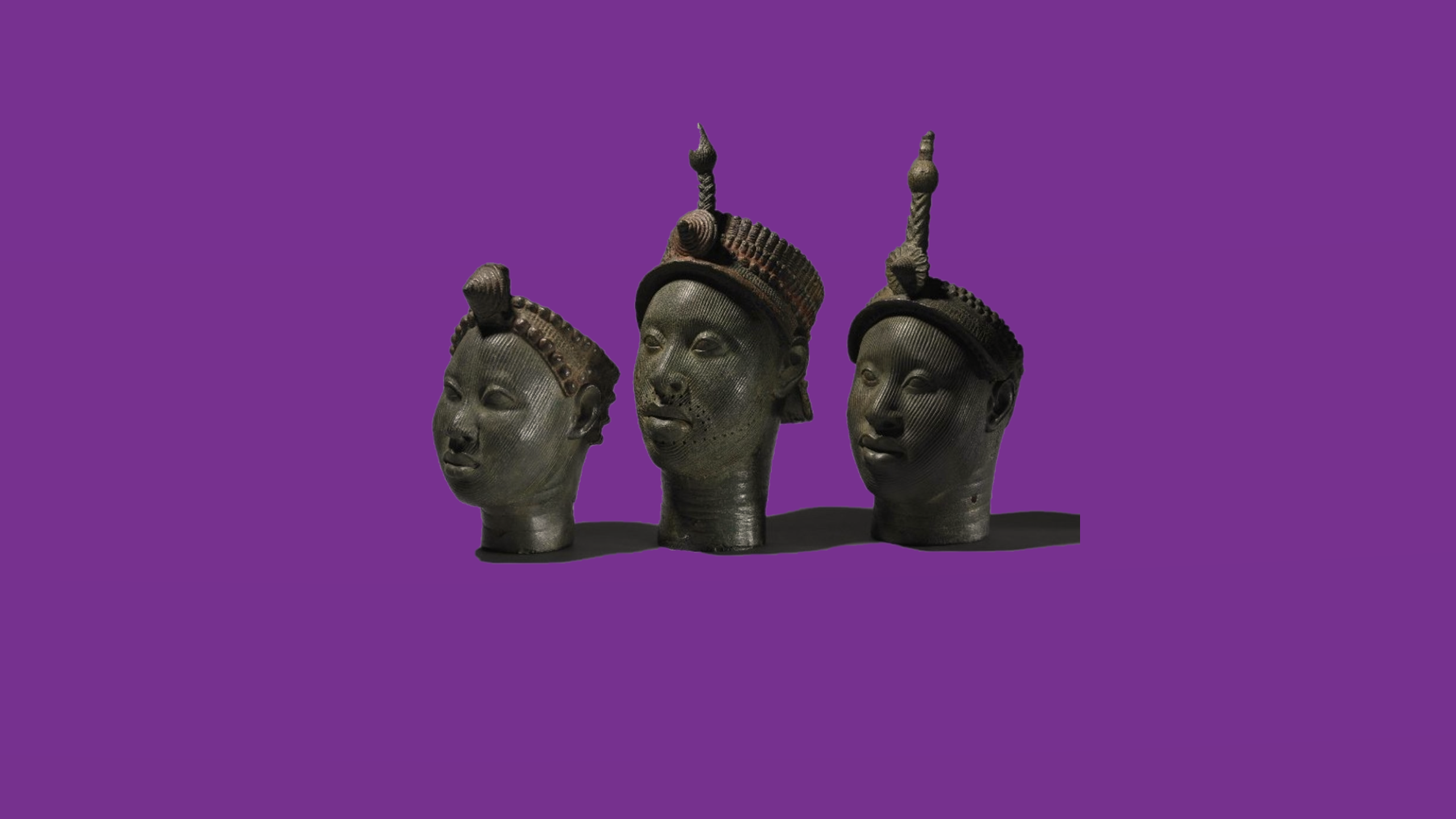 Three bronze heads from Nigeria on a purple background HD Wallpaper