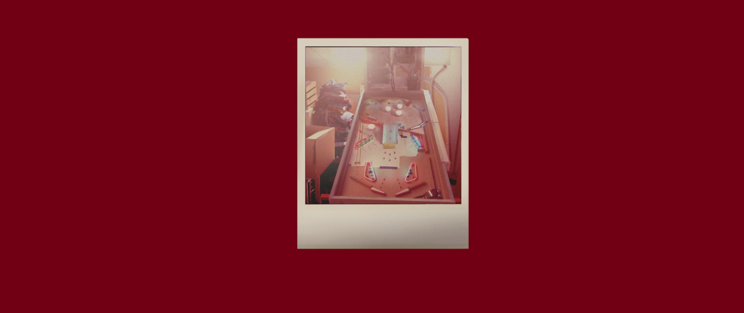 Pinball machine in a room HD Wallpaper