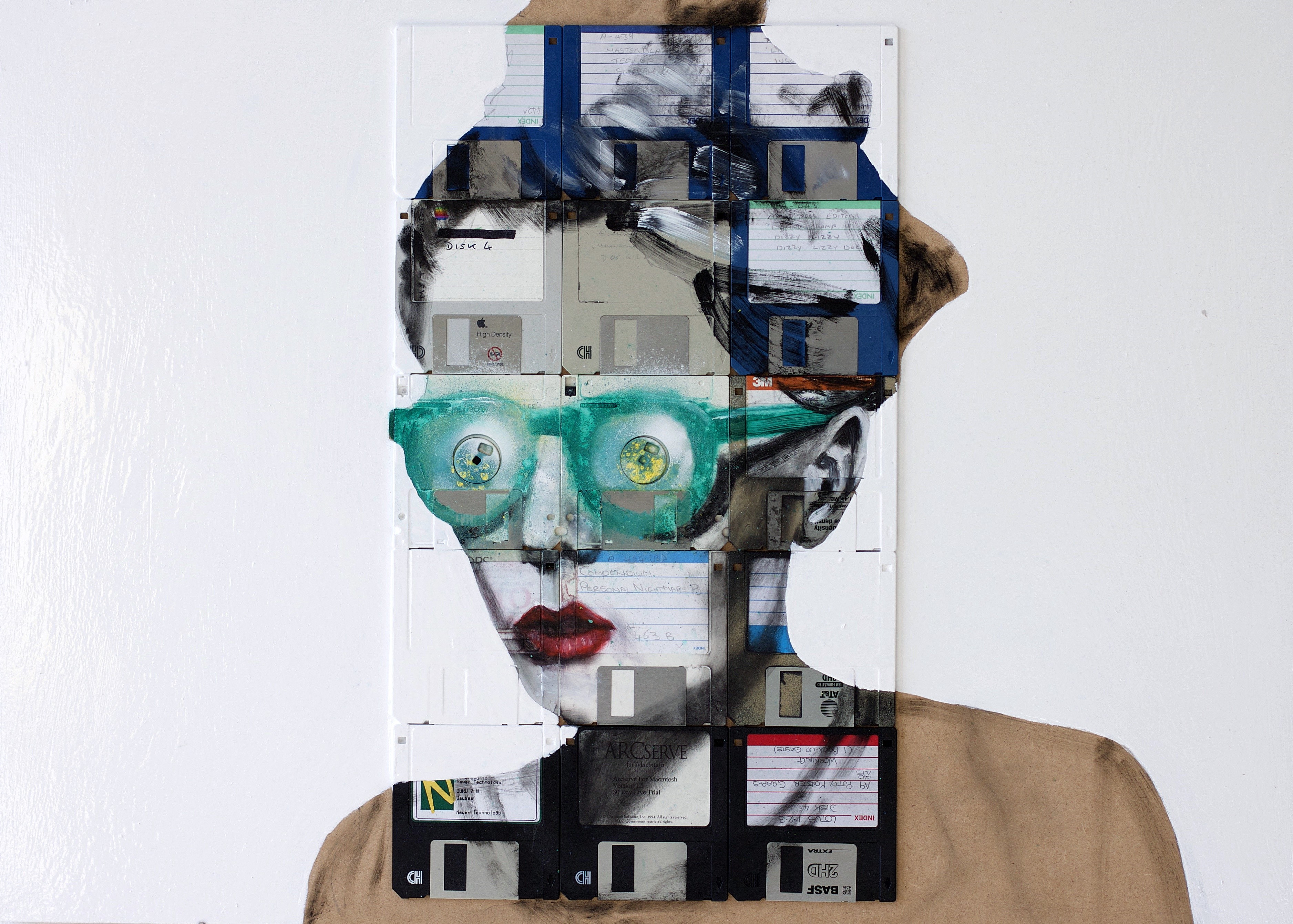 Artwork by Nick Gentry featuring a face made of floppy disks HD Wallpaper