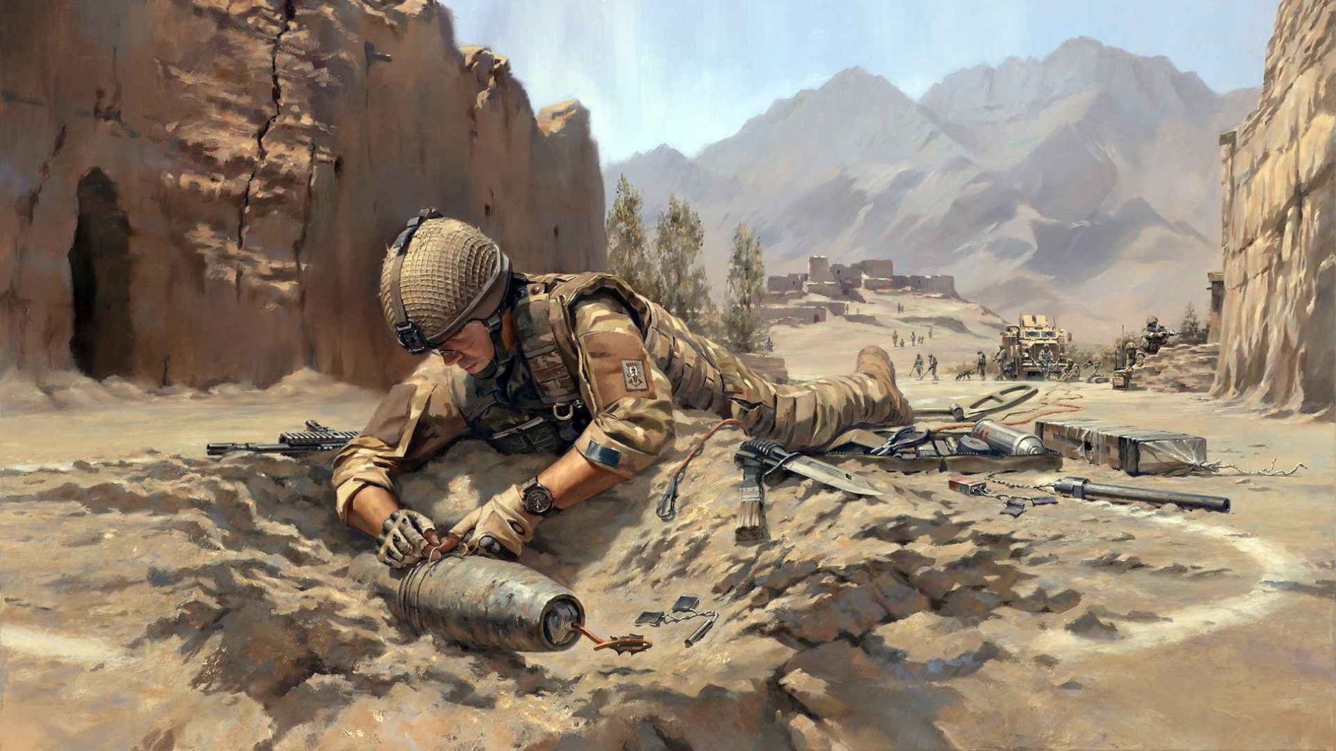 Soldier disarming a bomb in a desert landscape HD Wallpaper