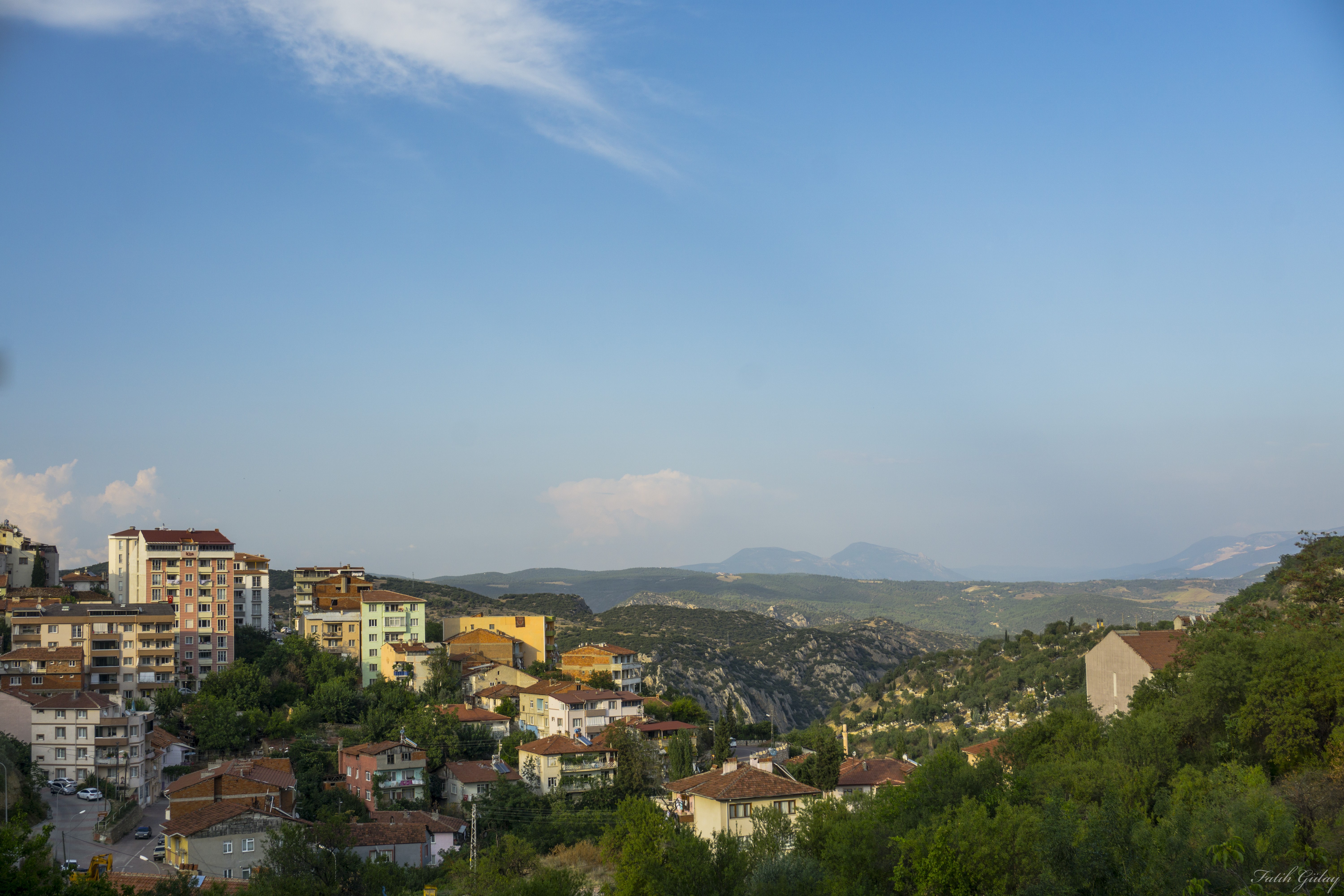 Cityscape with mountains and blue sky in Turkey HD Wallpaper