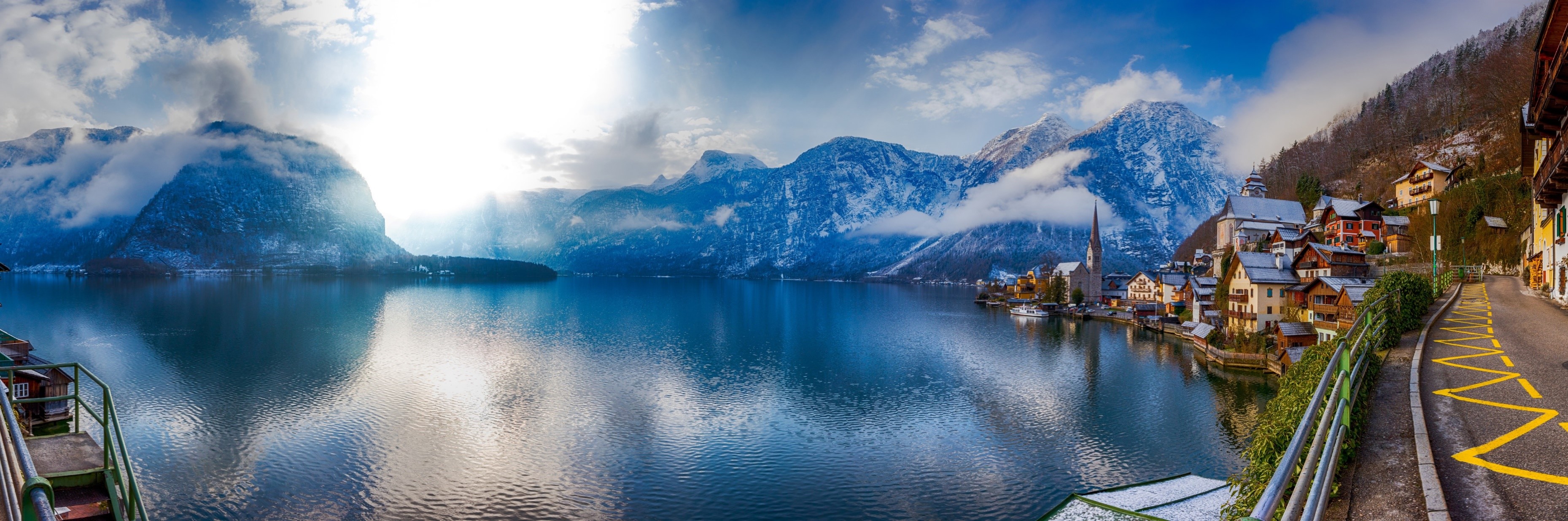 Hallstatt village and lake in Austria with snowy mountains HD Wallpaper