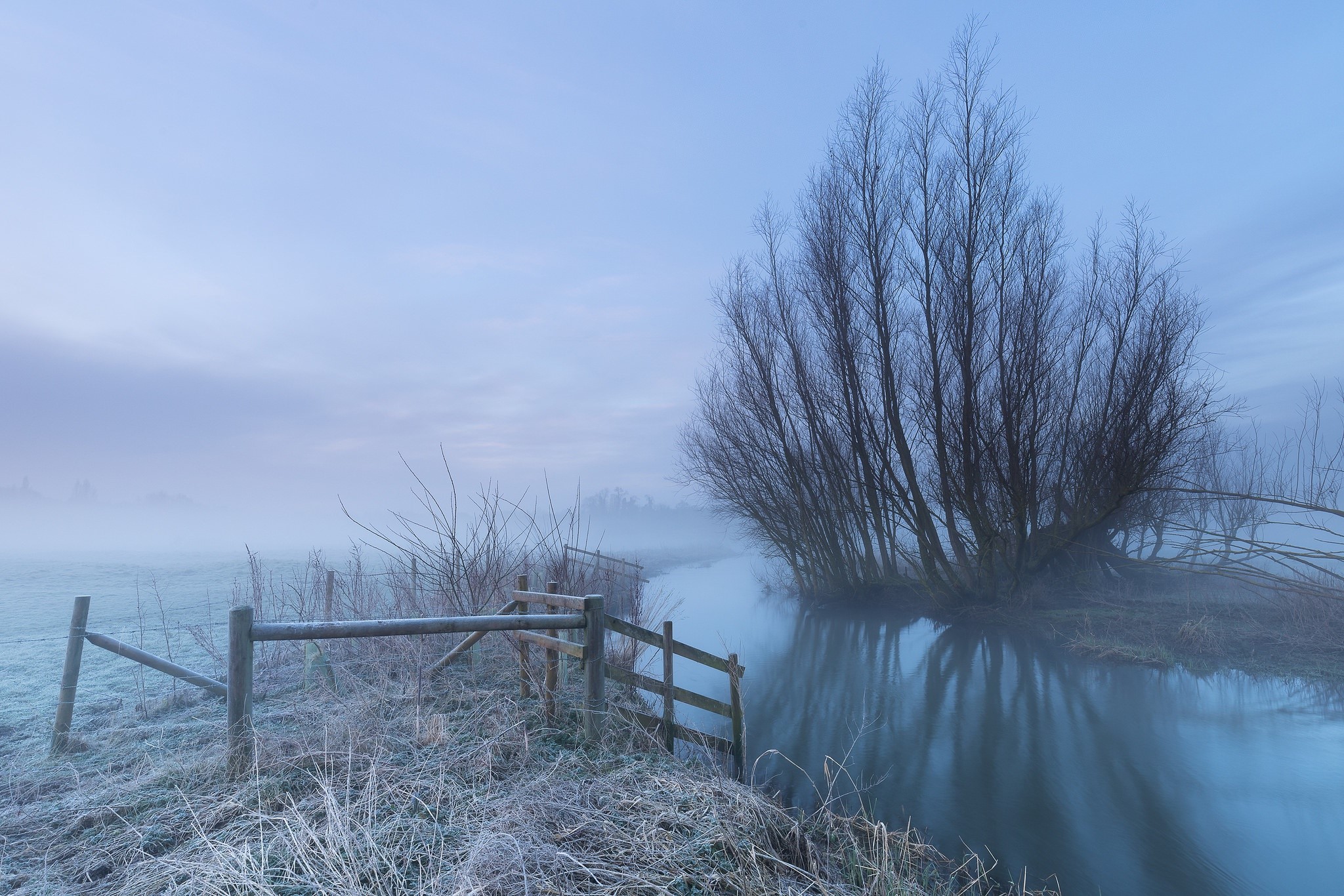 Winter landscape with fog and a river HD Wallpaper