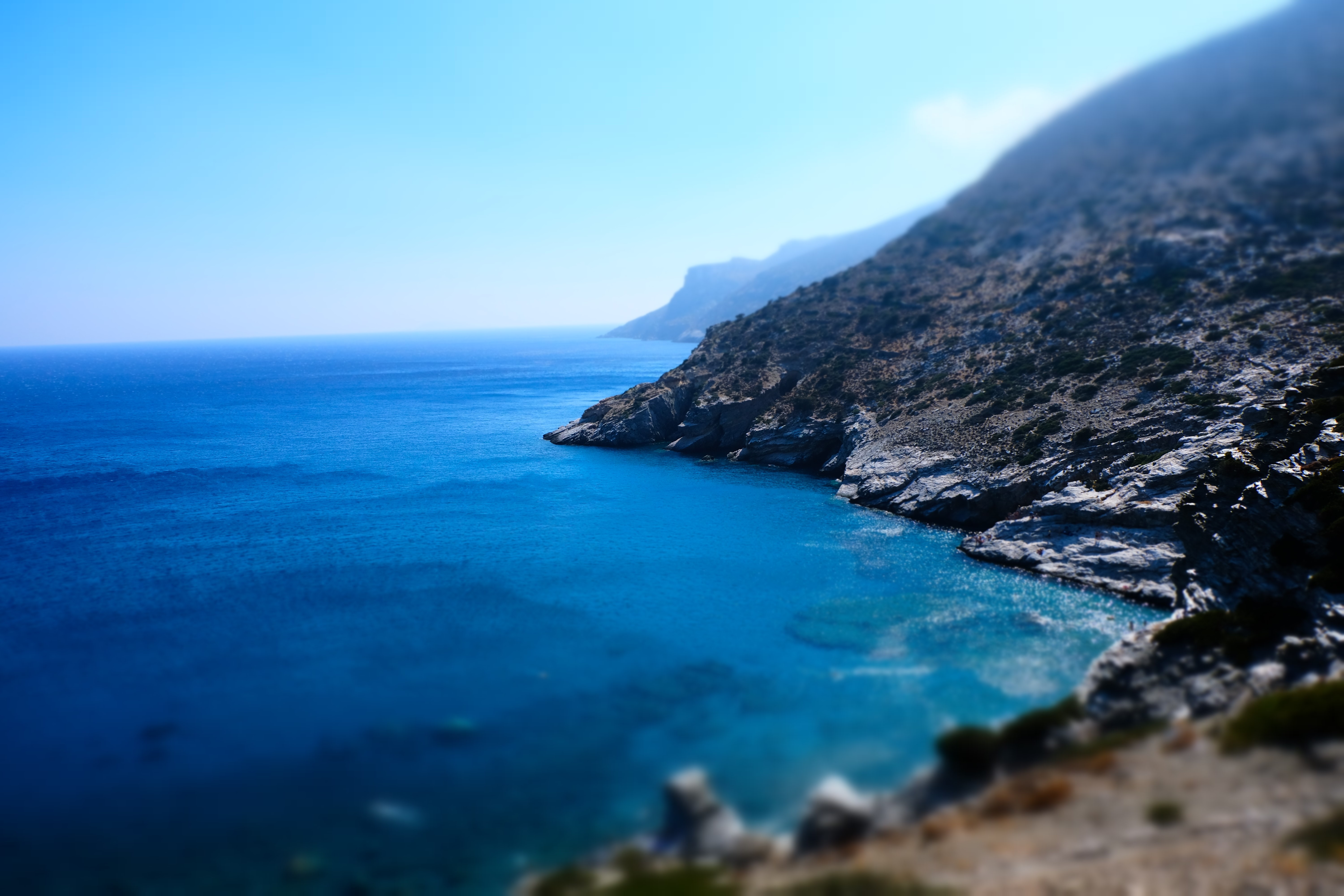 4K Blue Ocean and Rocky Coastline in Greece HD Wallpaper