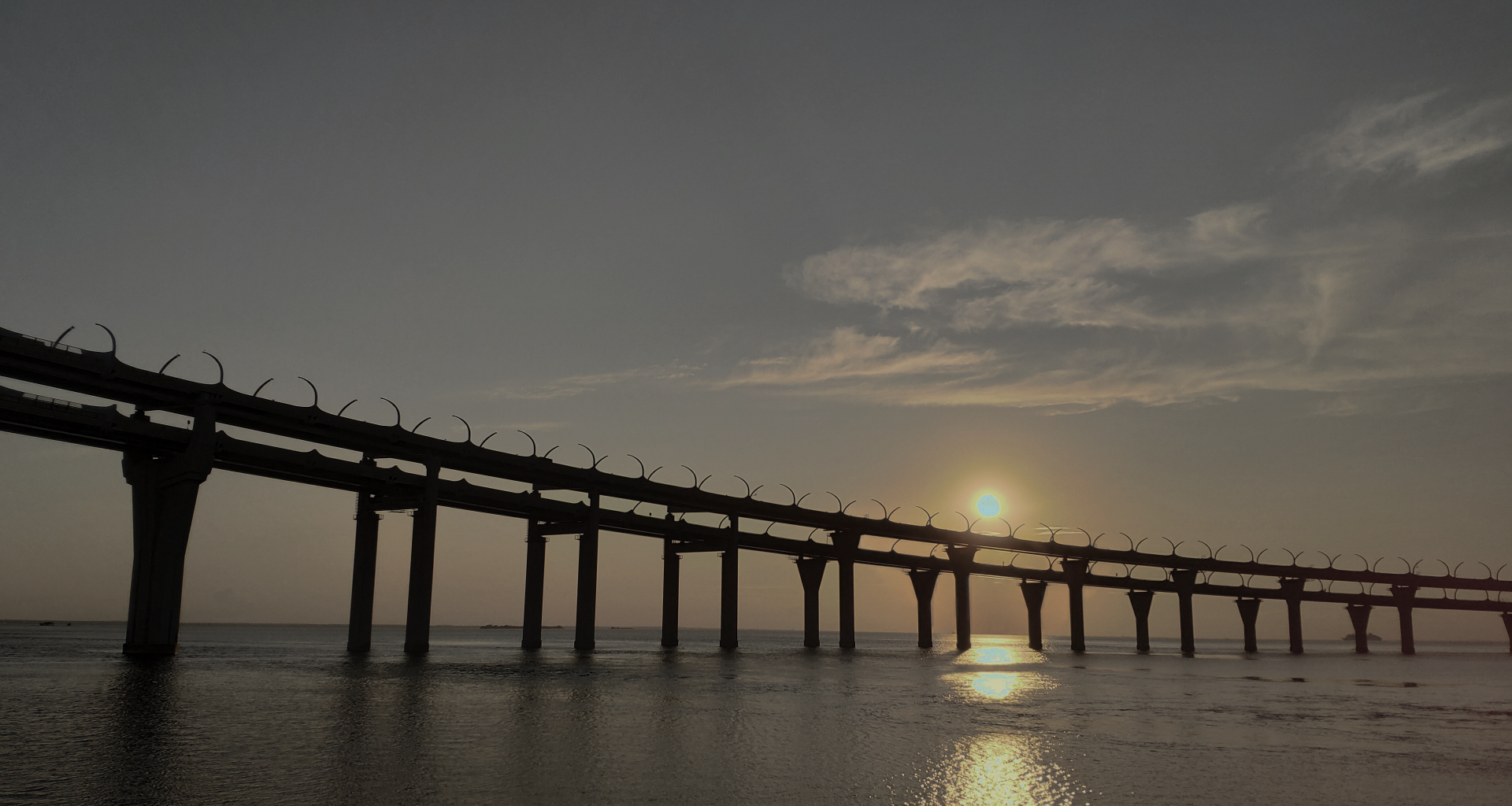 Sunset over a bridge on the Gulf HD Wallpaper