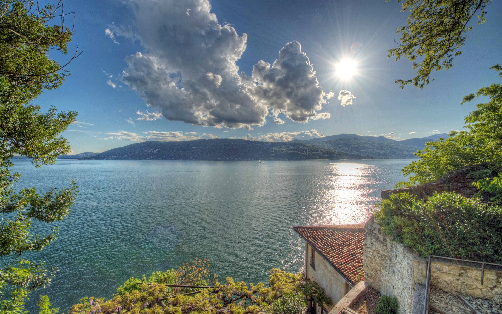 Lake with Mountains and Sunlit Clouds HD Wallpaper