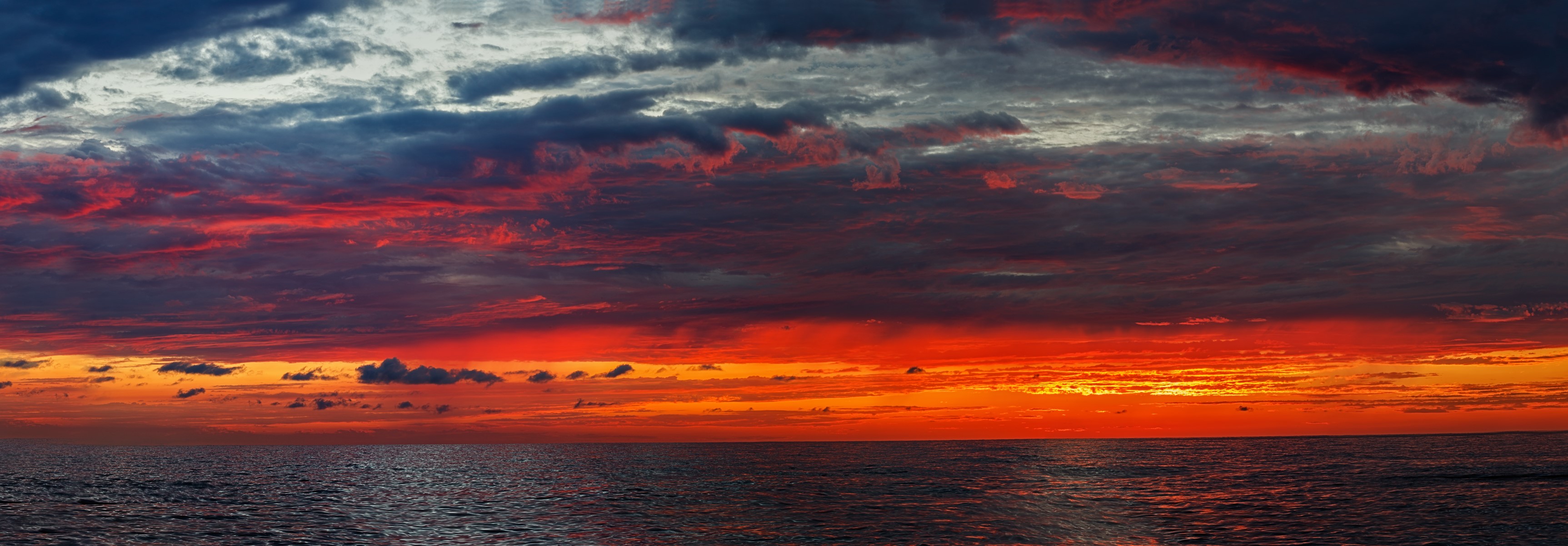 Sunset over the Black Sea with dramatic clouds HD Wallpaper