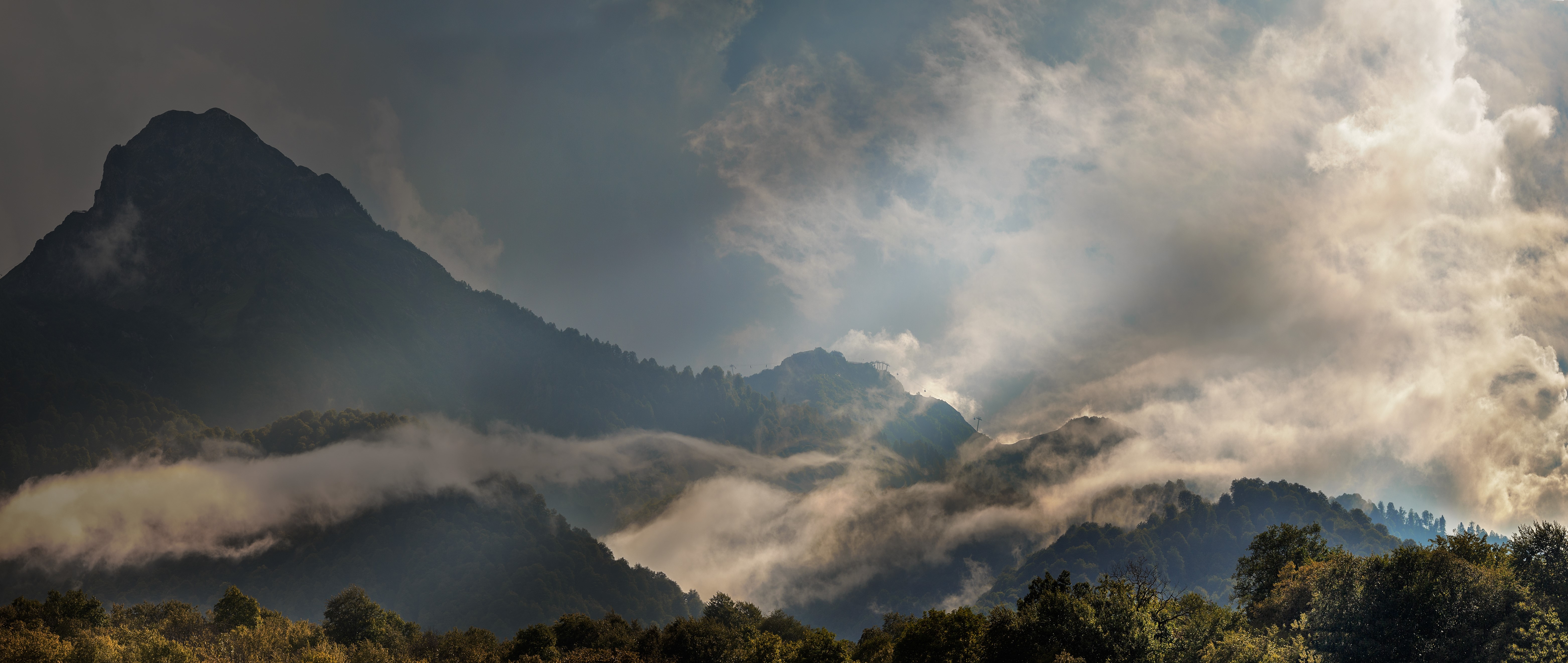 4K Caucasus Mountains with Mist and Clouds HD Wallpaper