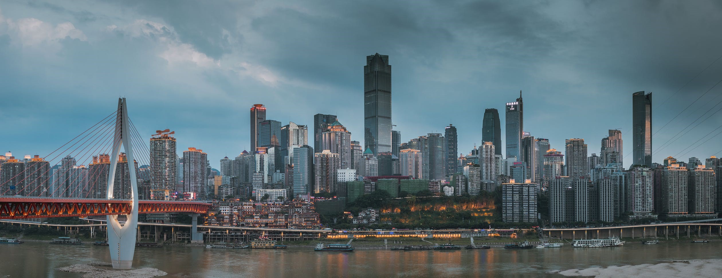 Chongqing city skyline and bridge over river HD Wallpaper
