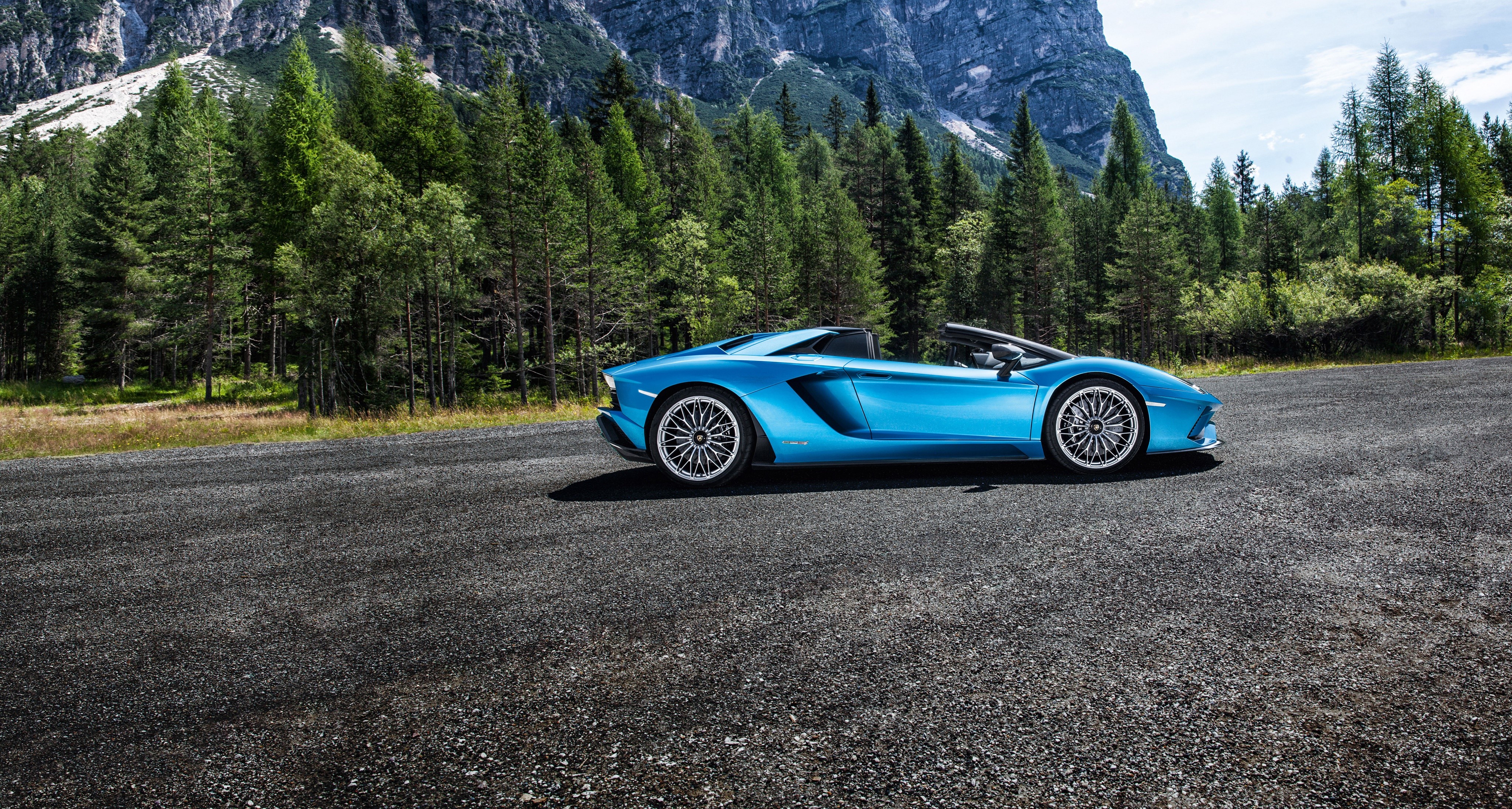Blue Lamborghini Aventador SVJ Roadster in mountains HD Wallpaper