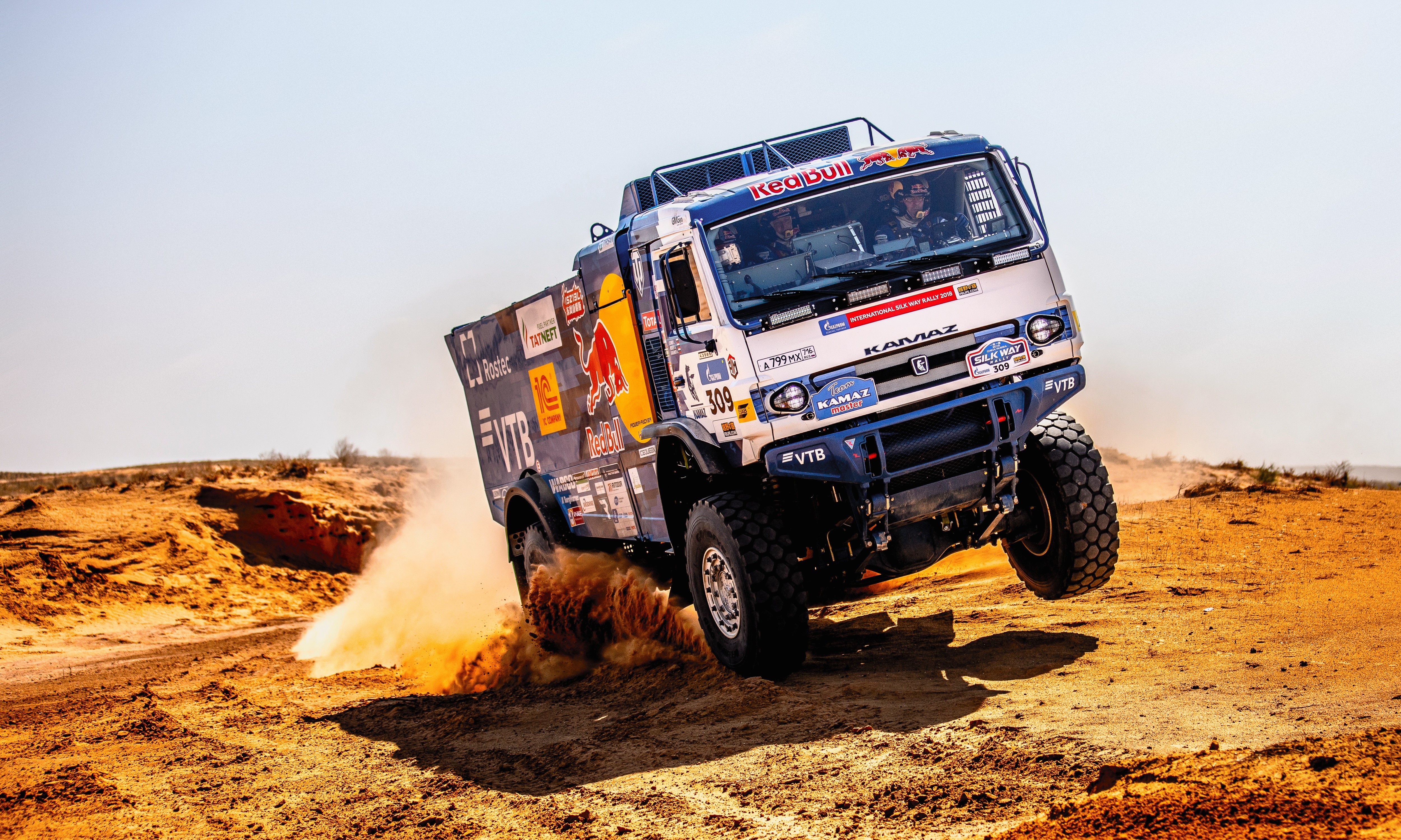 Kamaz truck racing in the desert HD Wallpaper