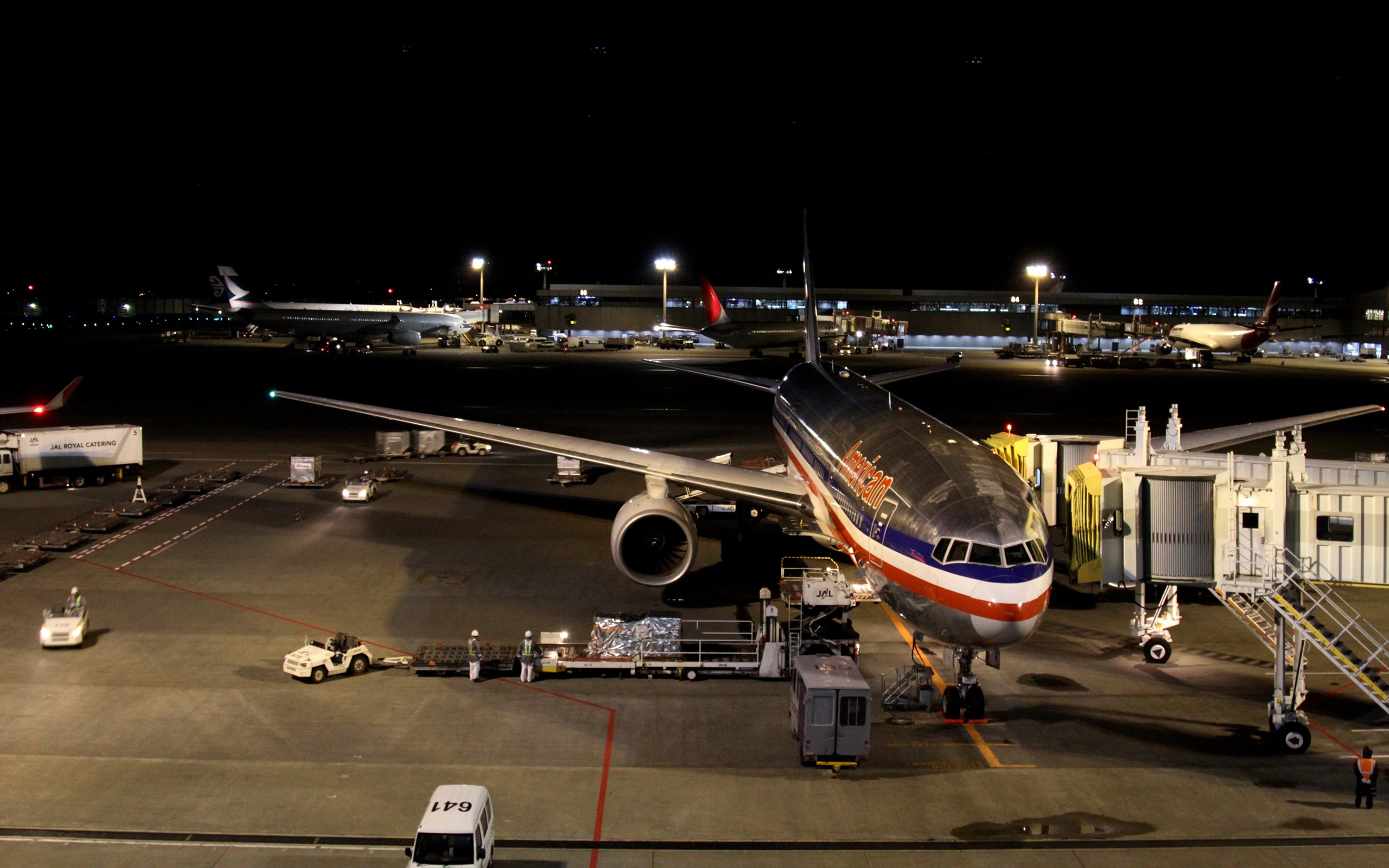 American Airlines Boeing 777 at airport at night HD Wallpaper