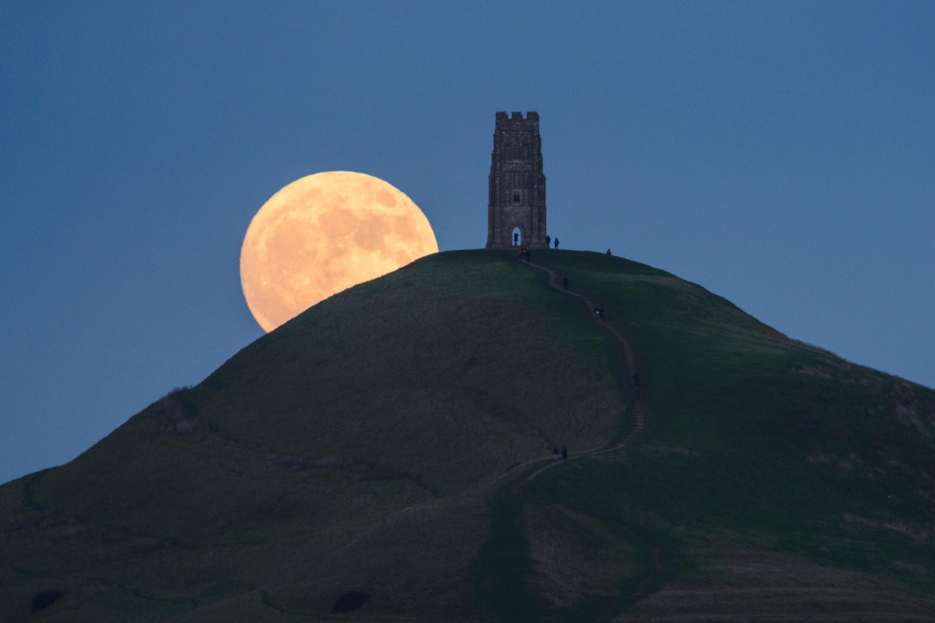 Full moon rising behind Glastonbury Tor tower, England HD Wallpaper
