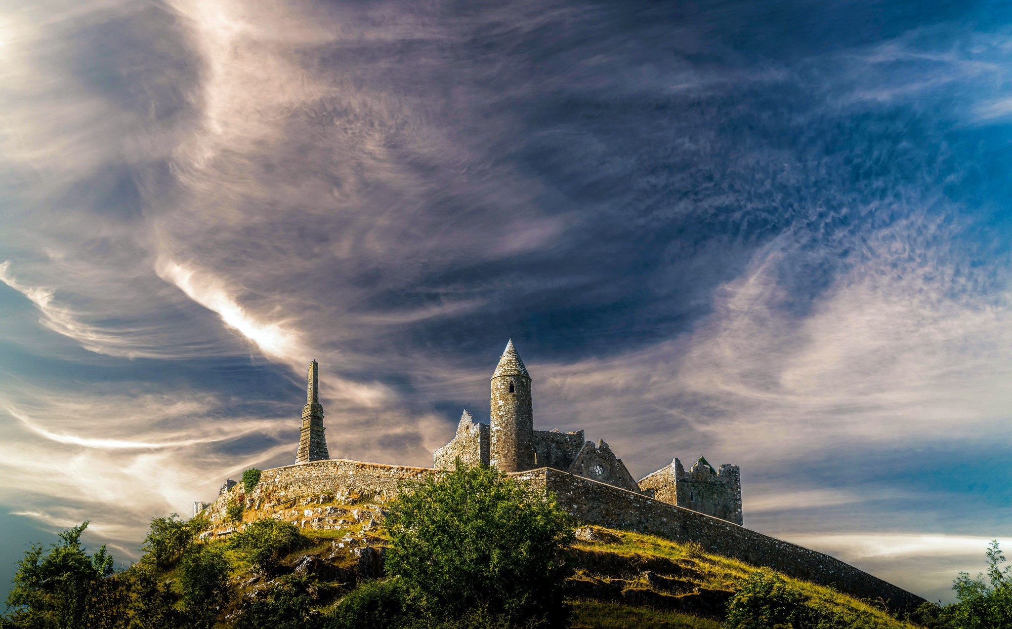 Rock of Cashel, Ireland under a dramatic sky HD Wallpaper