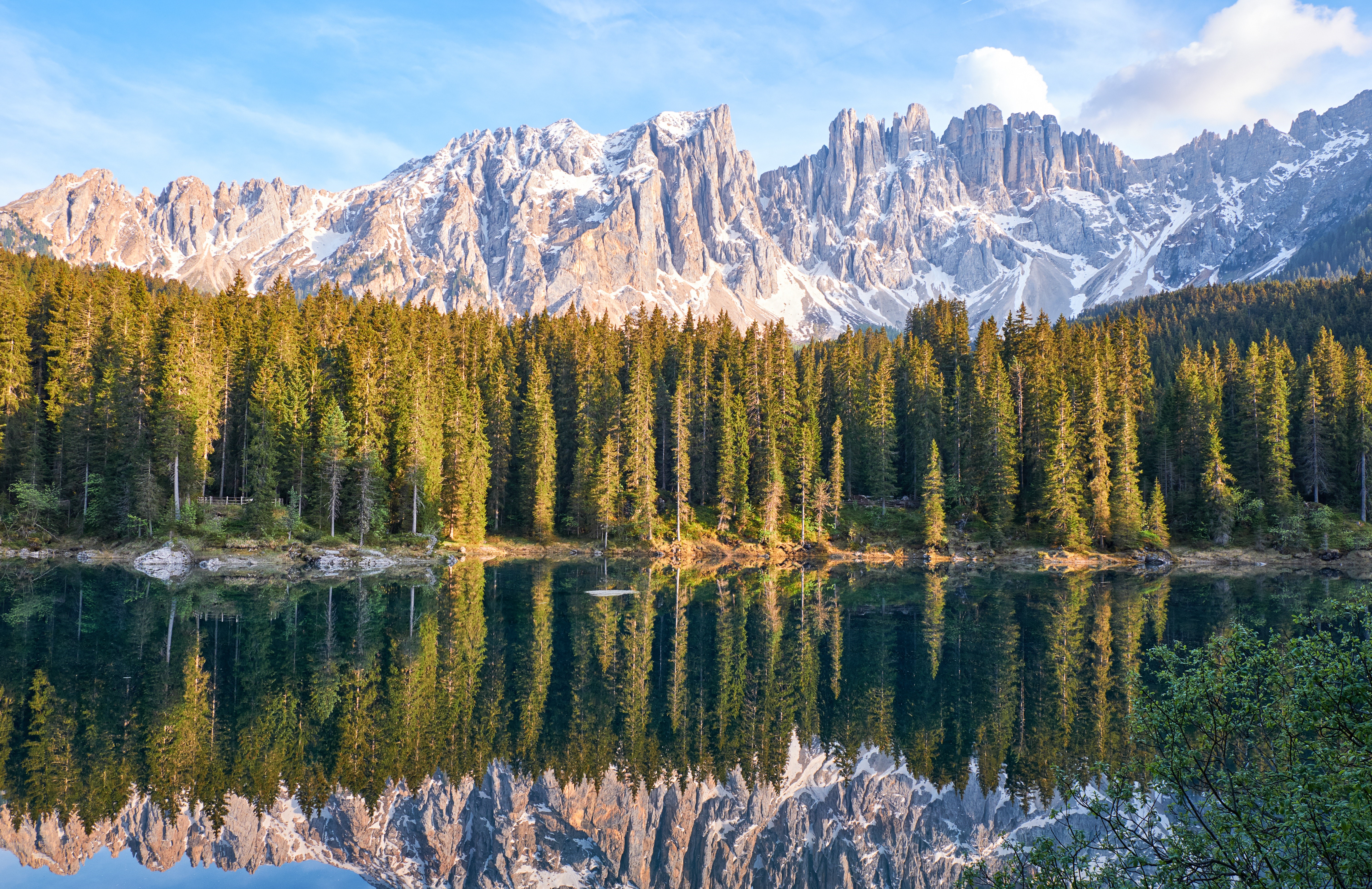 4K Karersee lake reflection of Dolomites mountains and forest HD Wallpaper