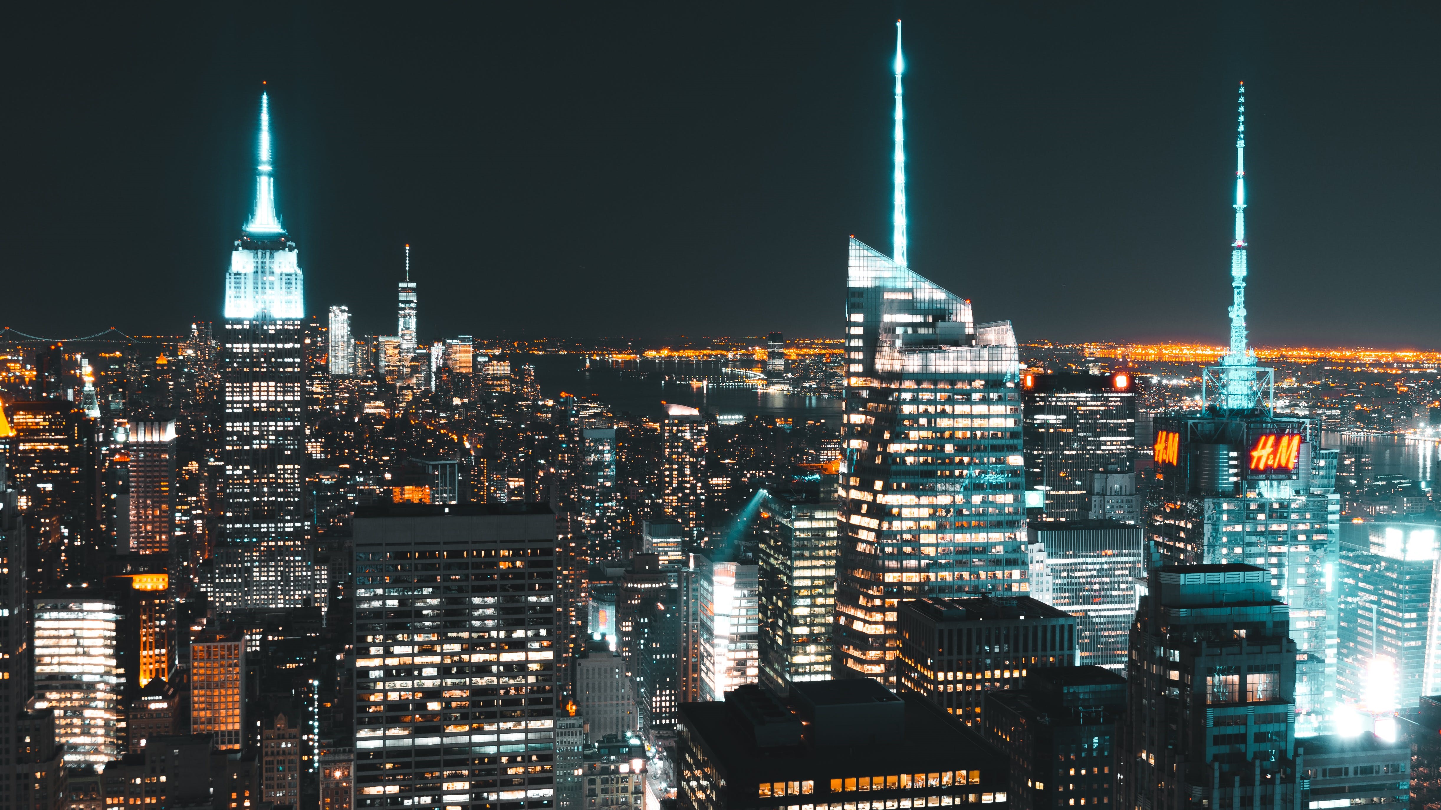 4K New York City cityscape with Empire State Building at night HD Wallpaper