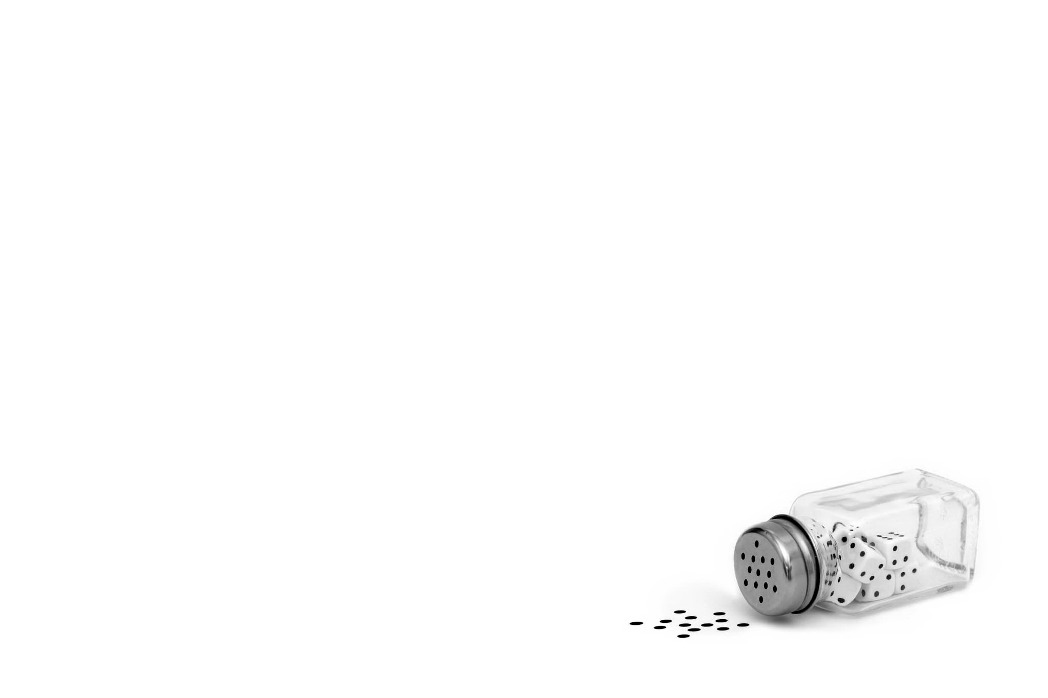 Dice in a salt shaker HD Wallpaper