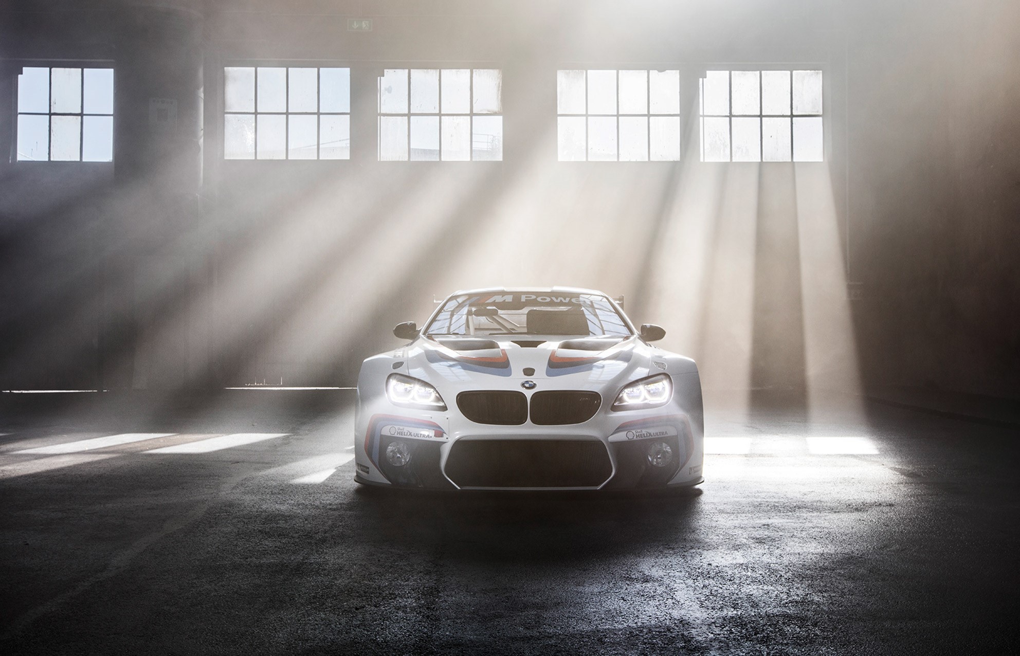 BMW M Power race car in a warehouse HD Wallpaper