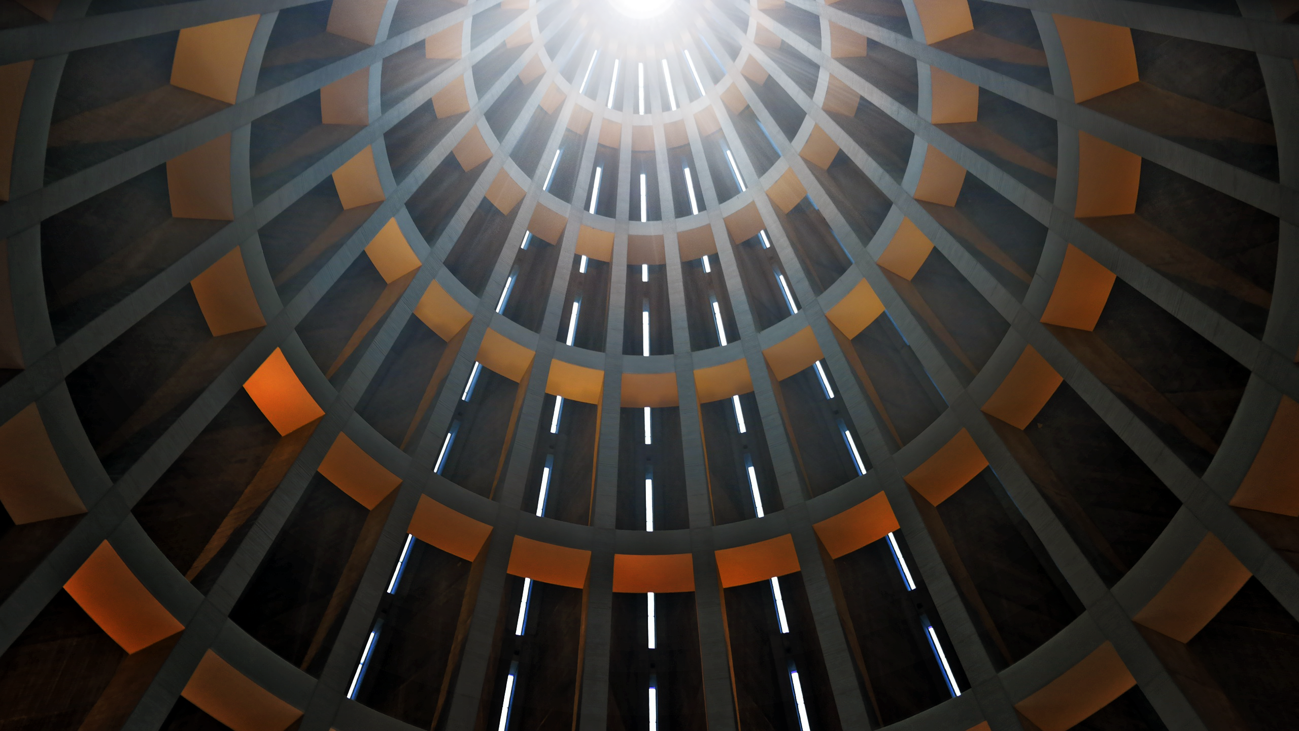Interior of a dome with sunlight streaming through HD Wallpaper