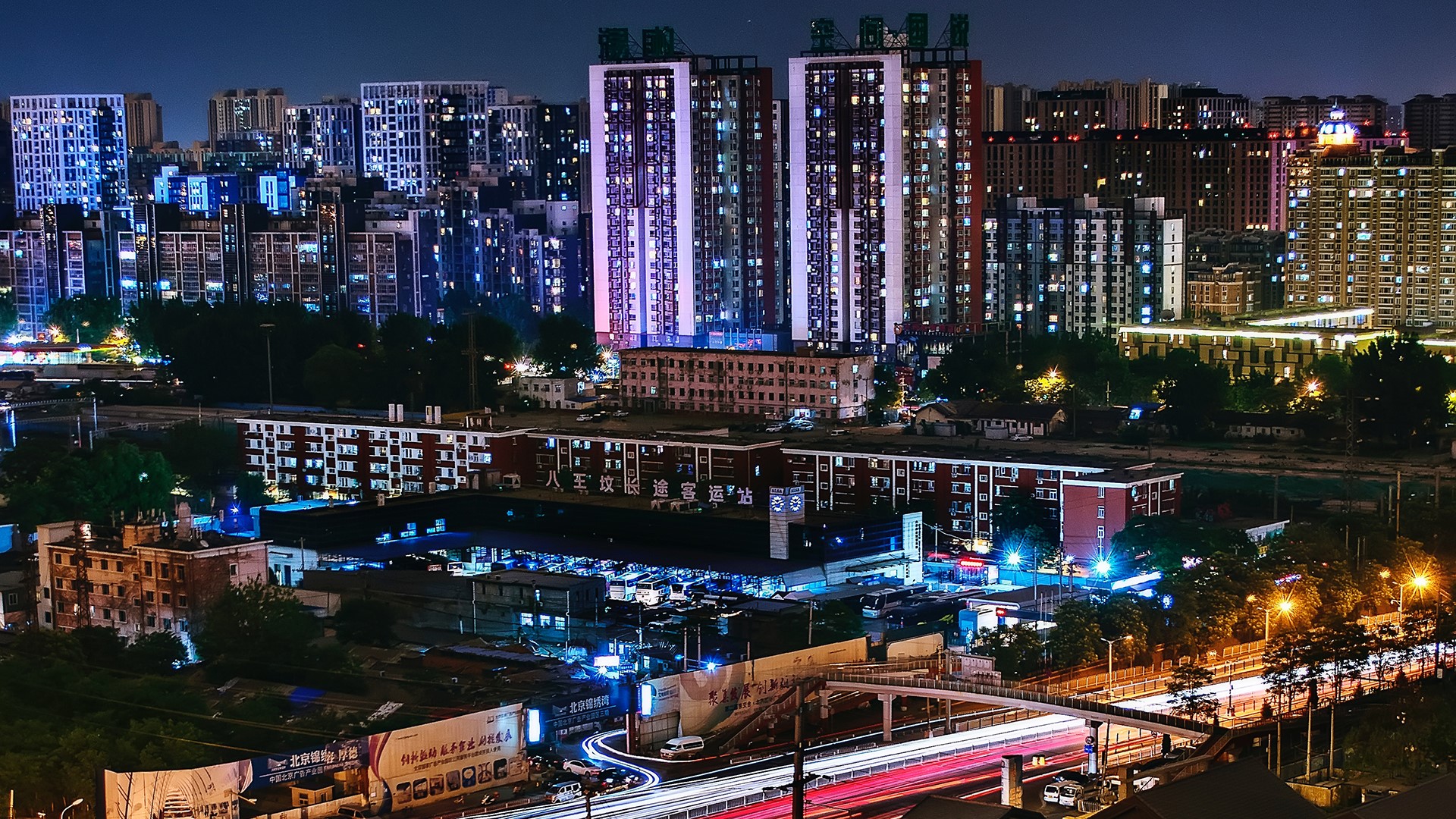 Cityscape of Beijing at night with light trails HD Wallpaper