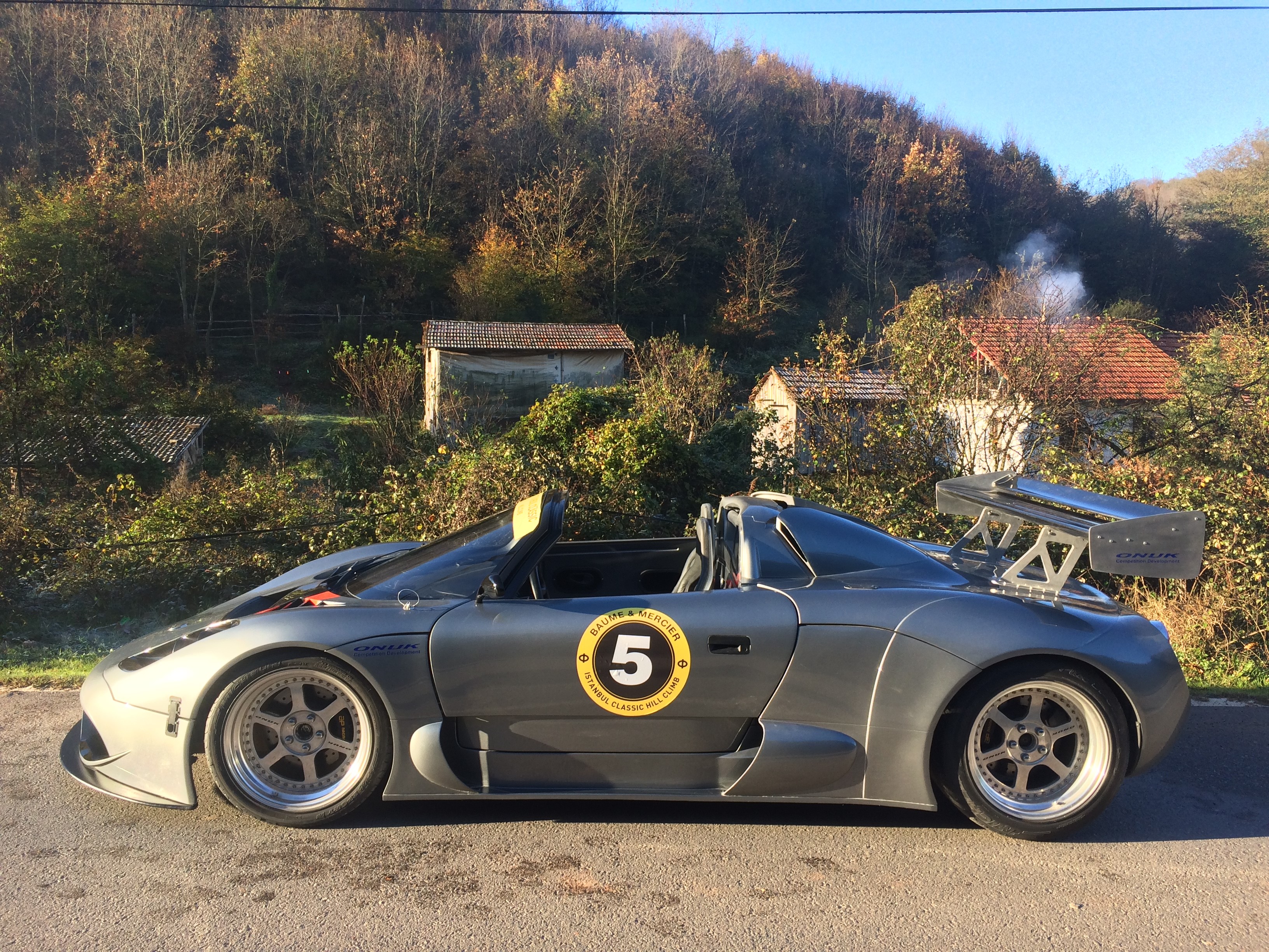 Silver sports car with racing number 5 HD Wallpaper