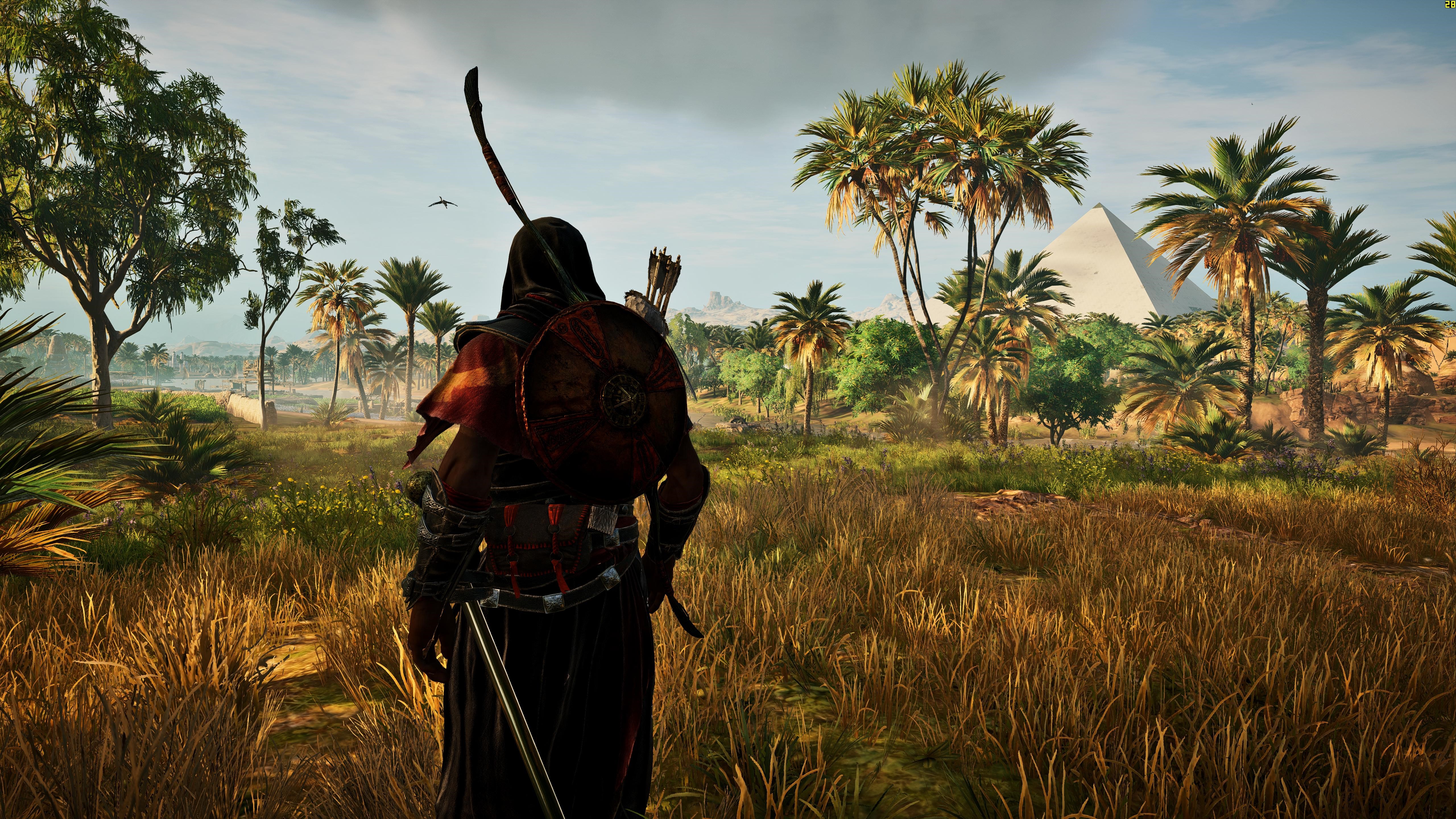 Bayek from Assassin's Creed Origins in a desert landscape HD Wallpaper