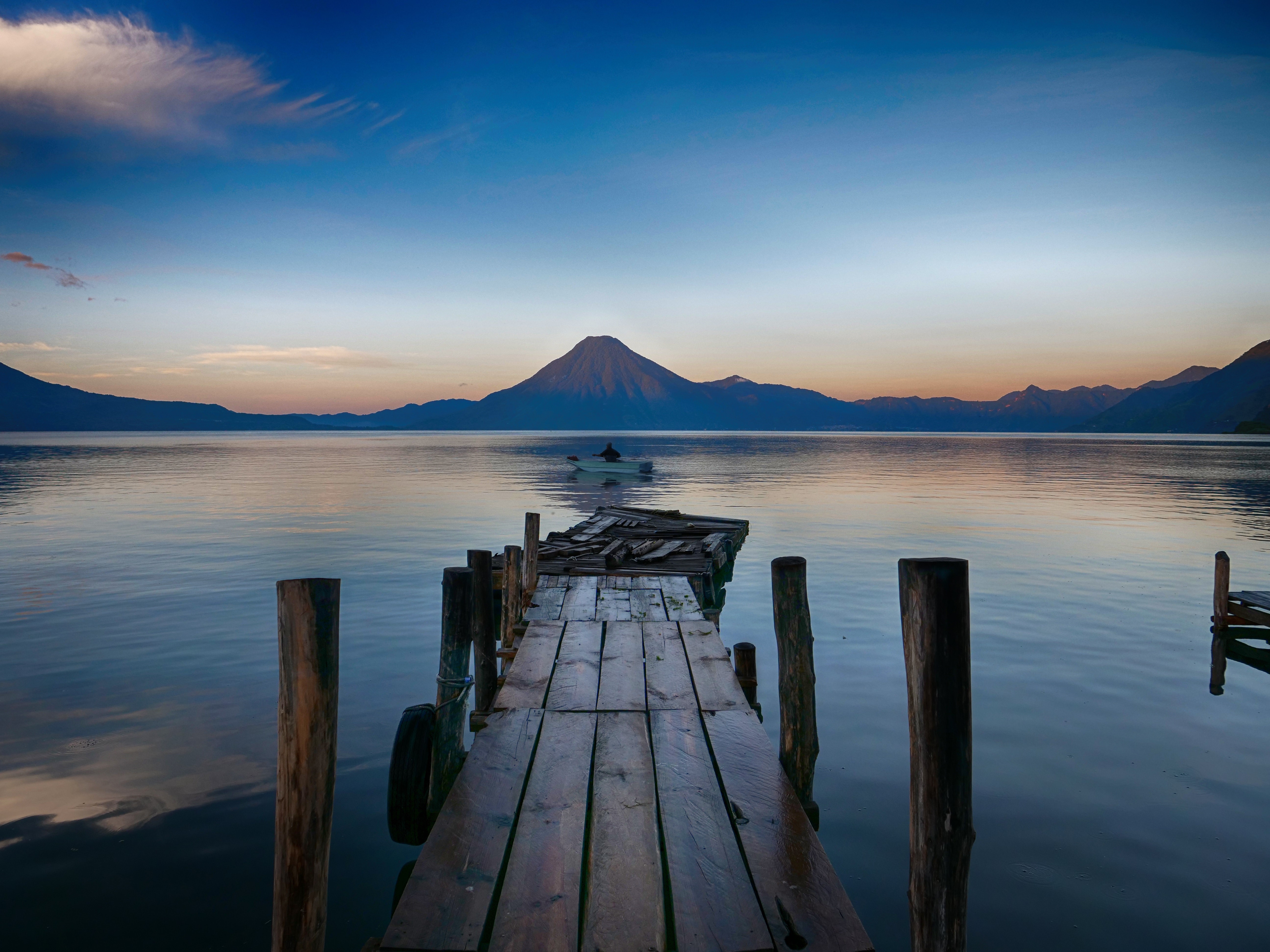 4K Lago de Atitlán landscape with pier and boat HD Wallpaper