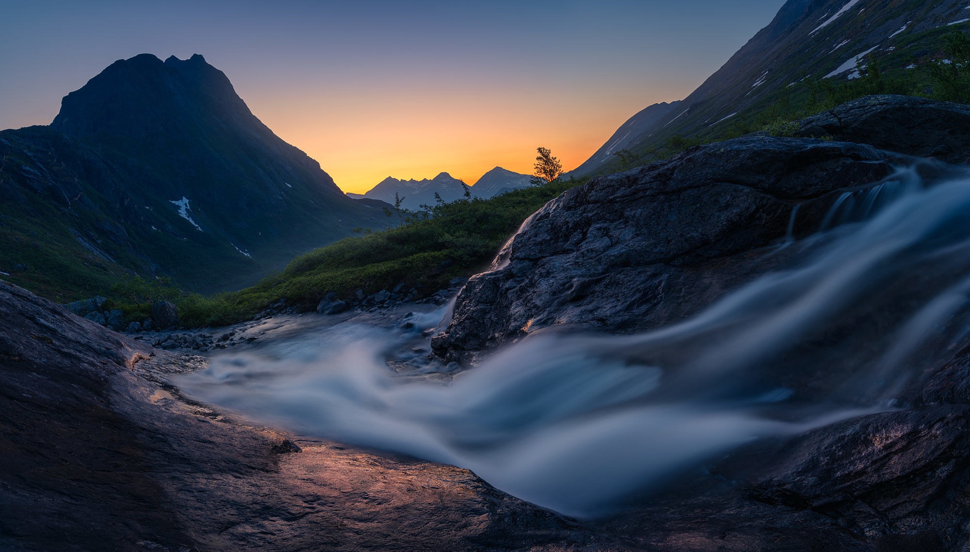 Mountain valley with a creek at sunset HD Wallpaper