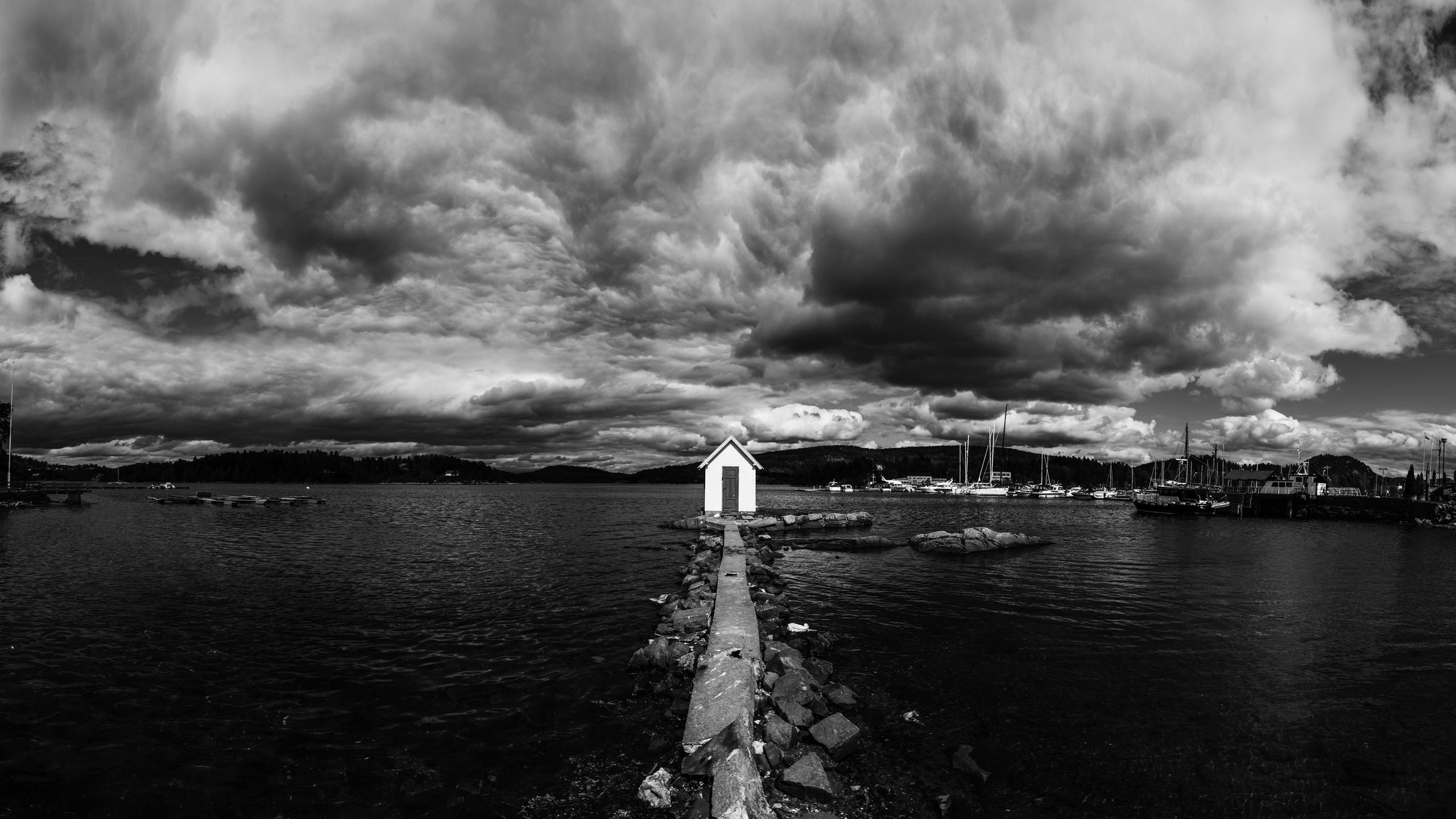 Monochrome seascape with a small house on a pier HD Wallpaper