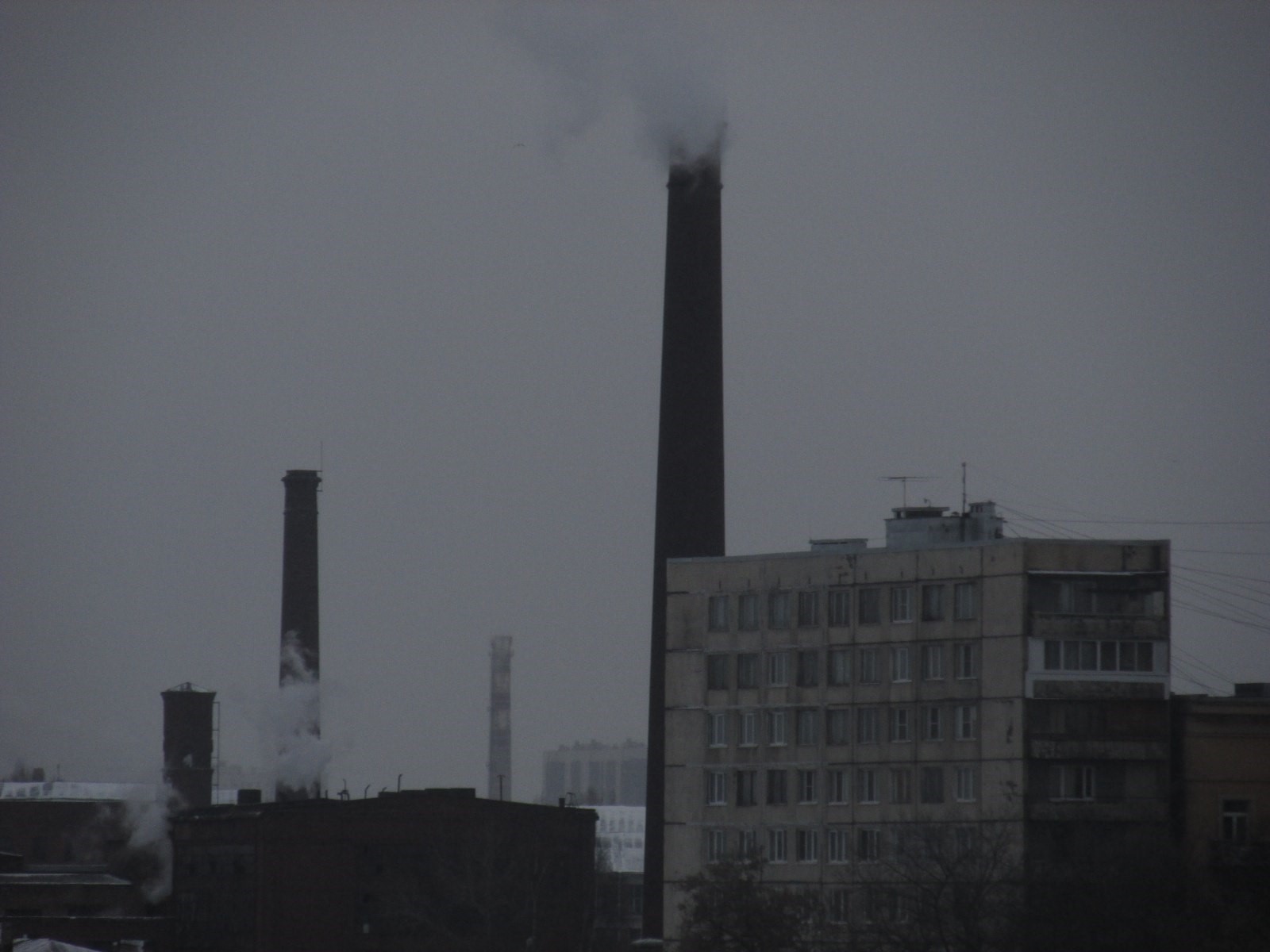 Industrial chimneys and apartment building in Russia HD Wallpaper