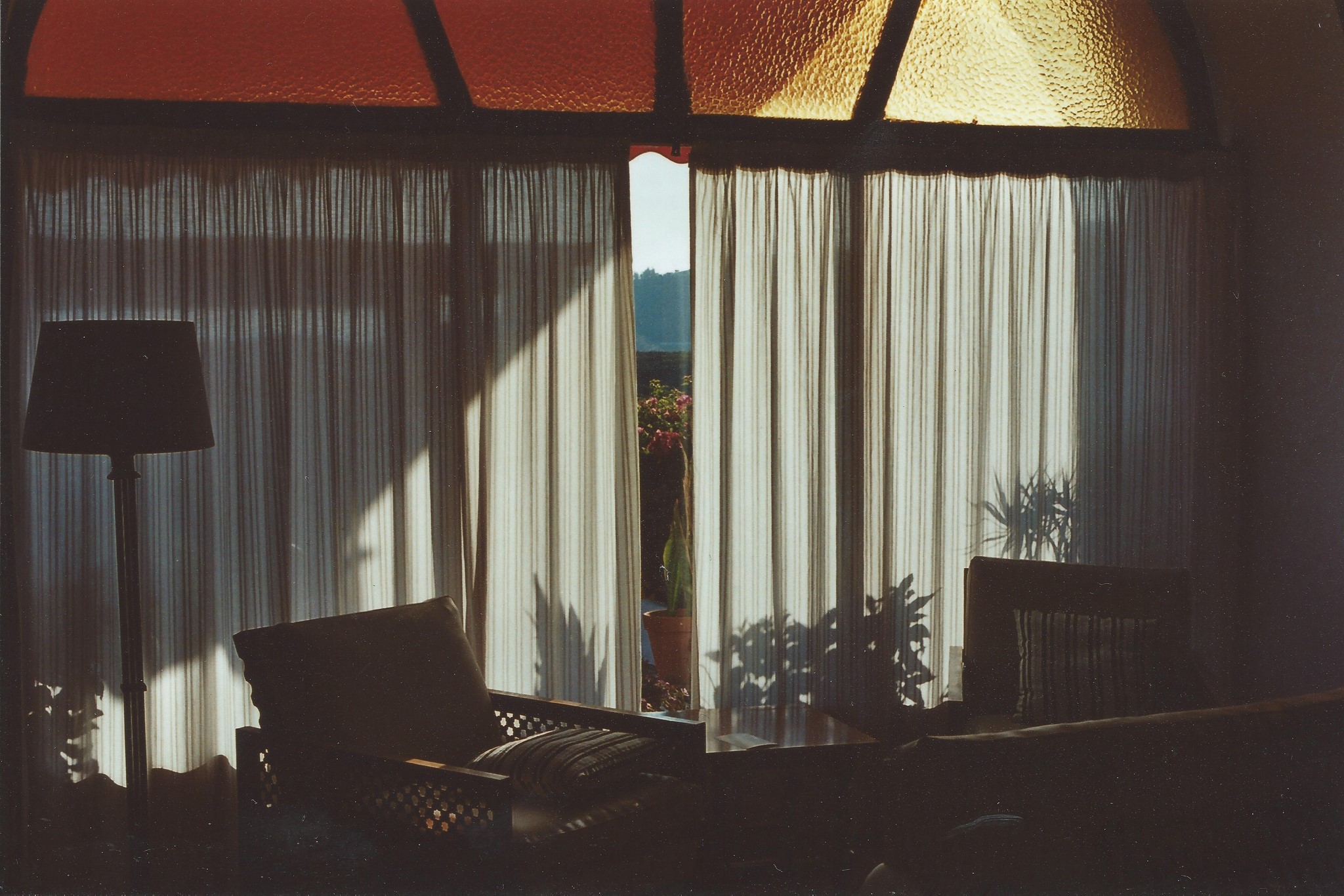 Sunlight through curtains in a room with furniture HD Wallpaper