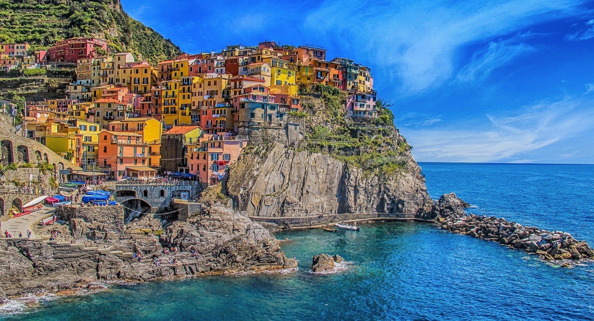 Colorful houses on a cliff overlooking the sea in Cinque Terre, Italy HD Wallpaper
