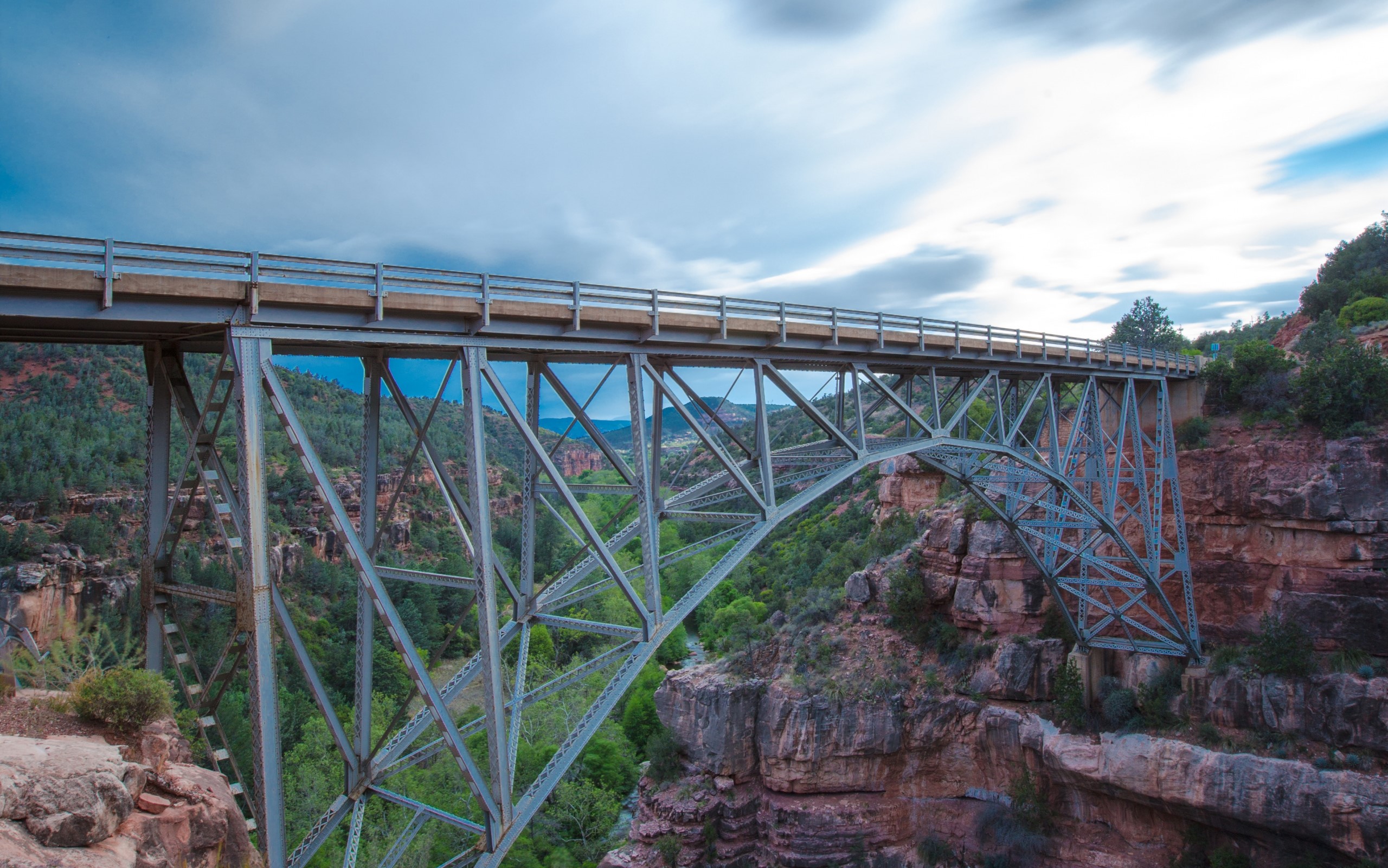 Steel Arch Bridge over a Forested Canyon in Arizona HD Wallpaper