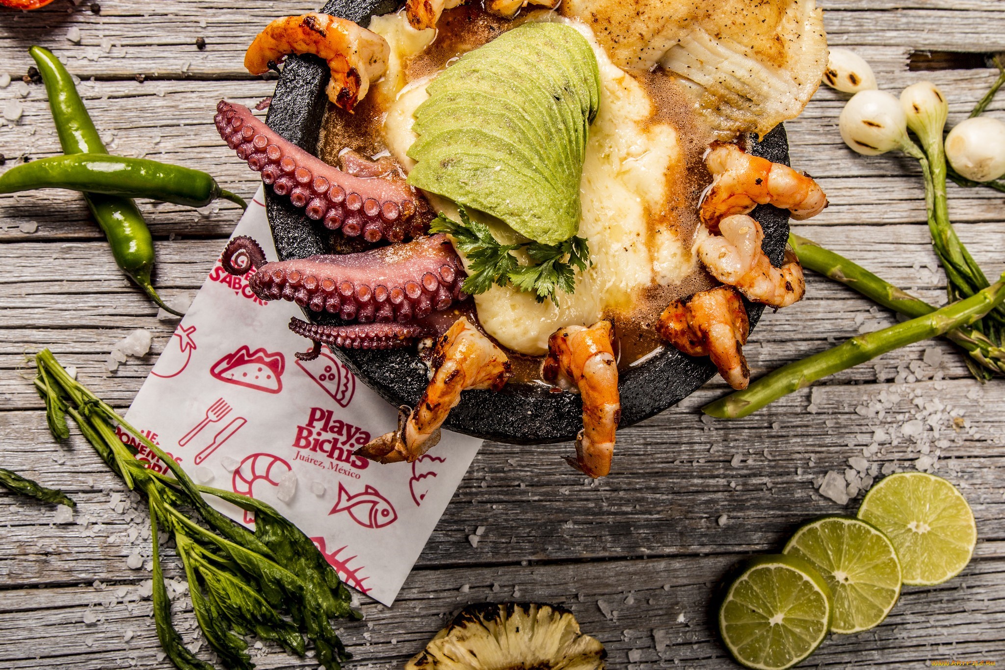 Seafood molcajete with octopus, shrimp, avocado, and lime HD Wallpaper