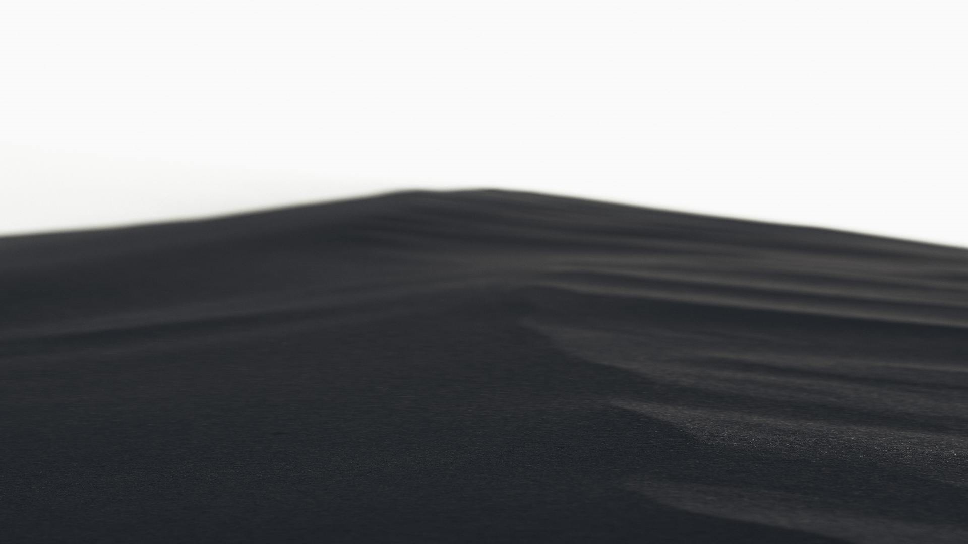 Black sand dunes against a white sky HD Wallpaper