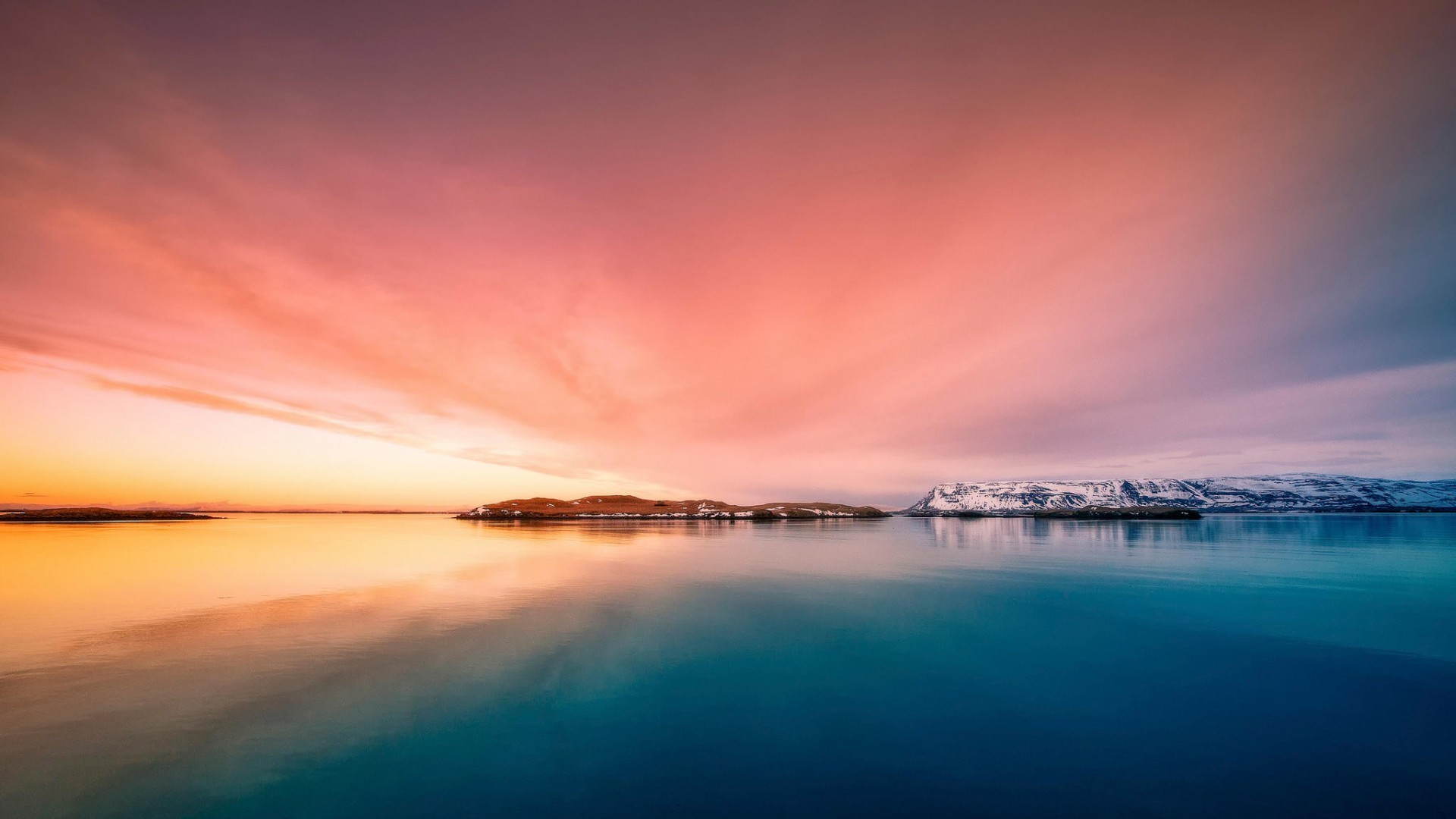 Calm sea and sky with islands at sunset HD Wallpaper