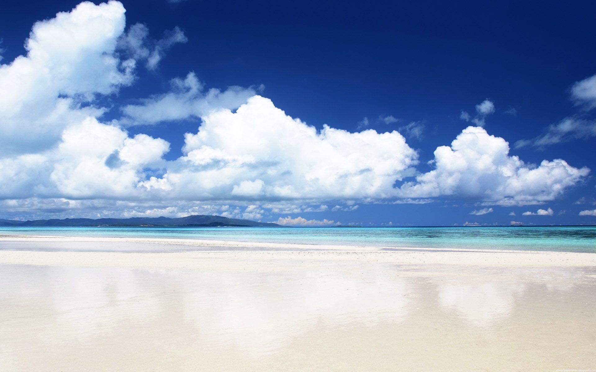 White sand beach with turquoise water and blue sky HD Wallpaper