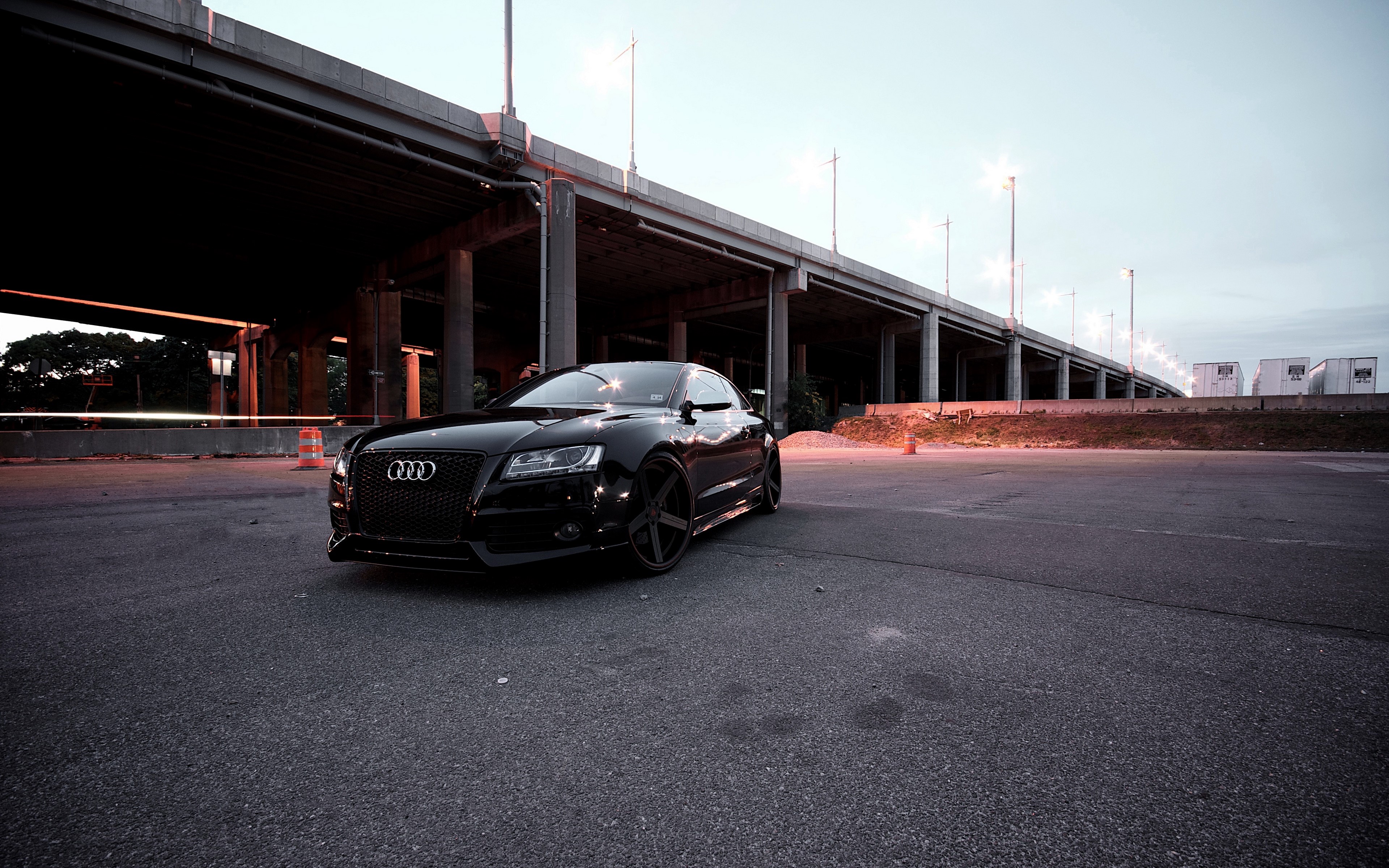 Black Audi car under a highway overpass HD Wallpaper