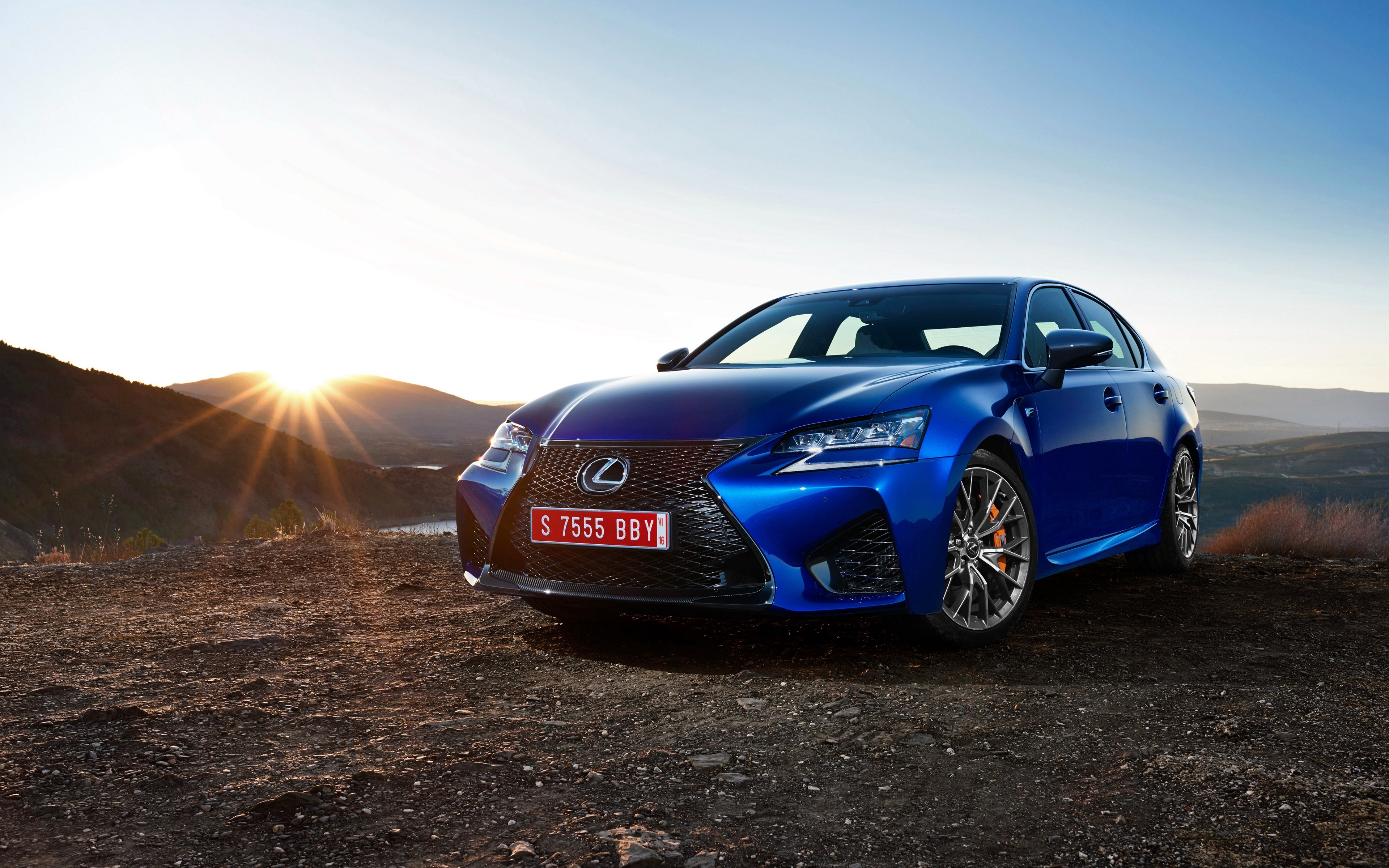 Blue Lexus GS F on a hill at sunset HD Wallpaper
