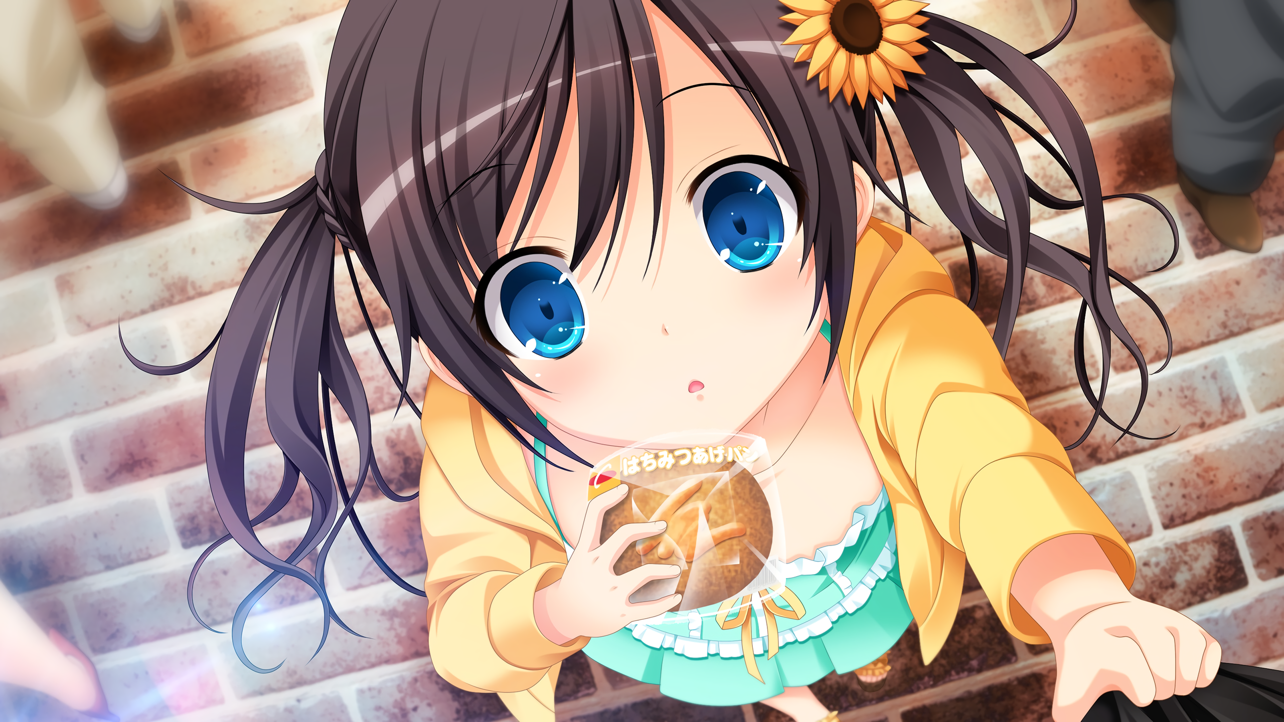 Girl with pigtails holding a snack HD Wallpaper