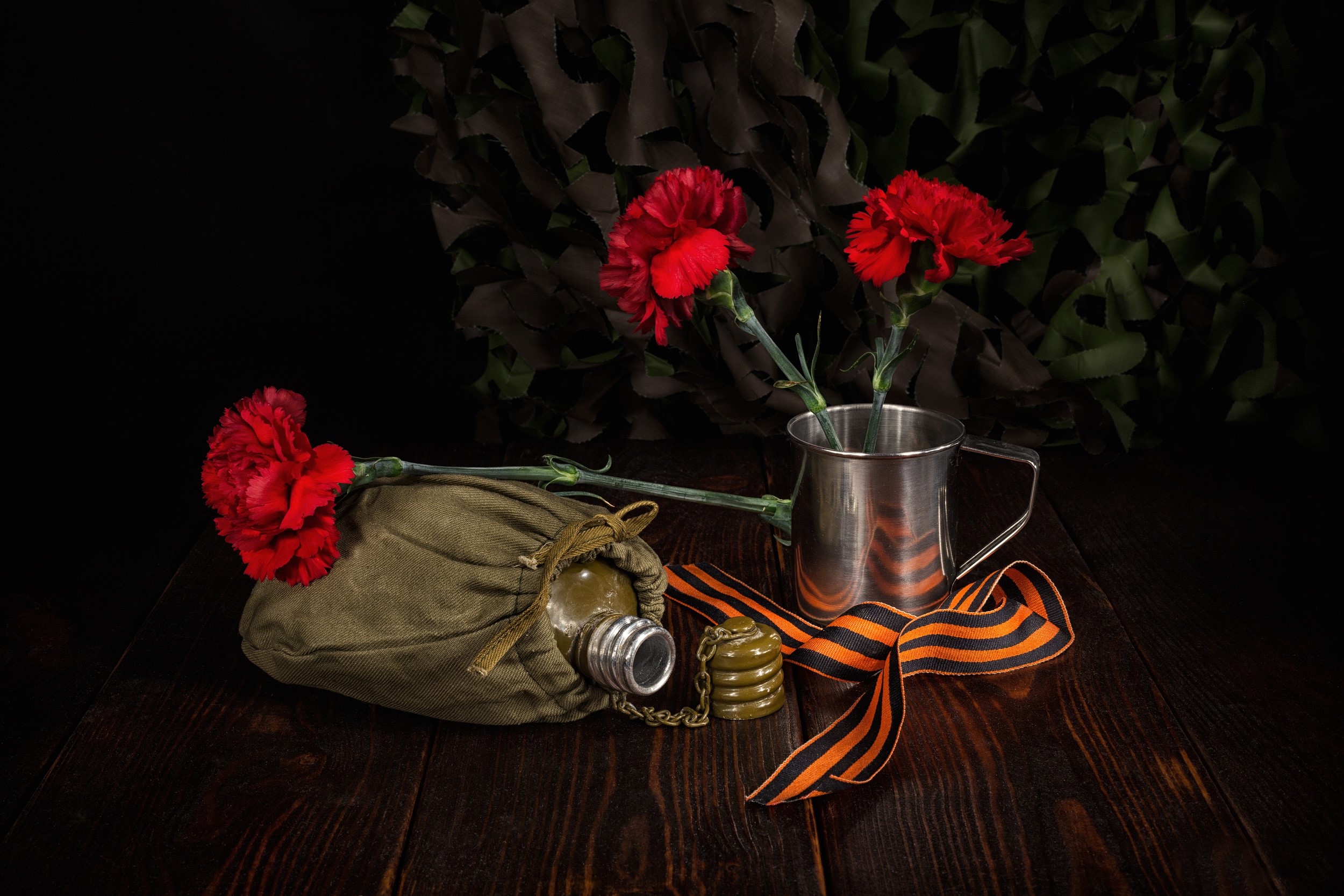 Still life with military items and red carnations HD Wallpaper