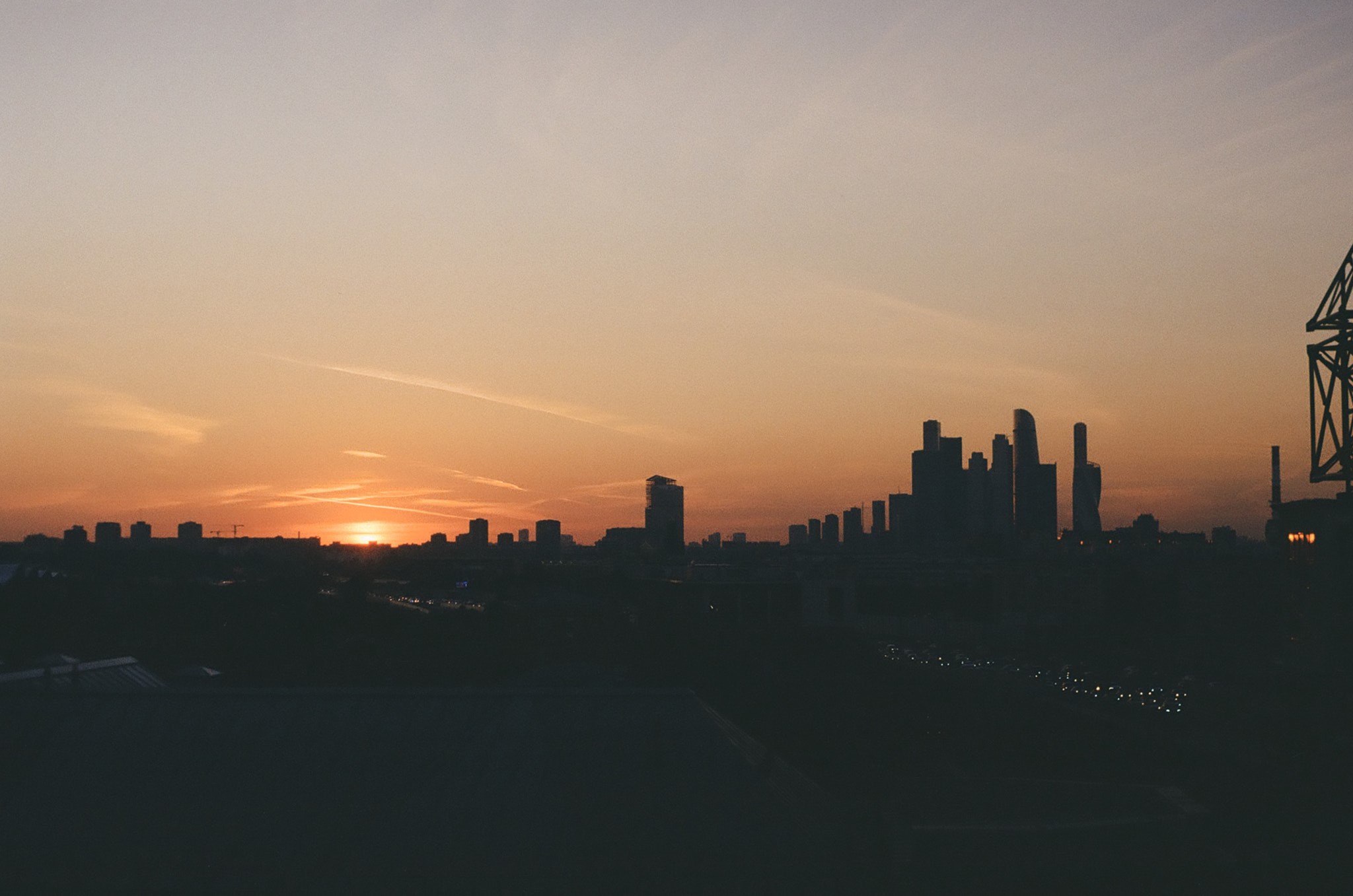 Cityscape at sunset with skyscrapers HD Wallpaper