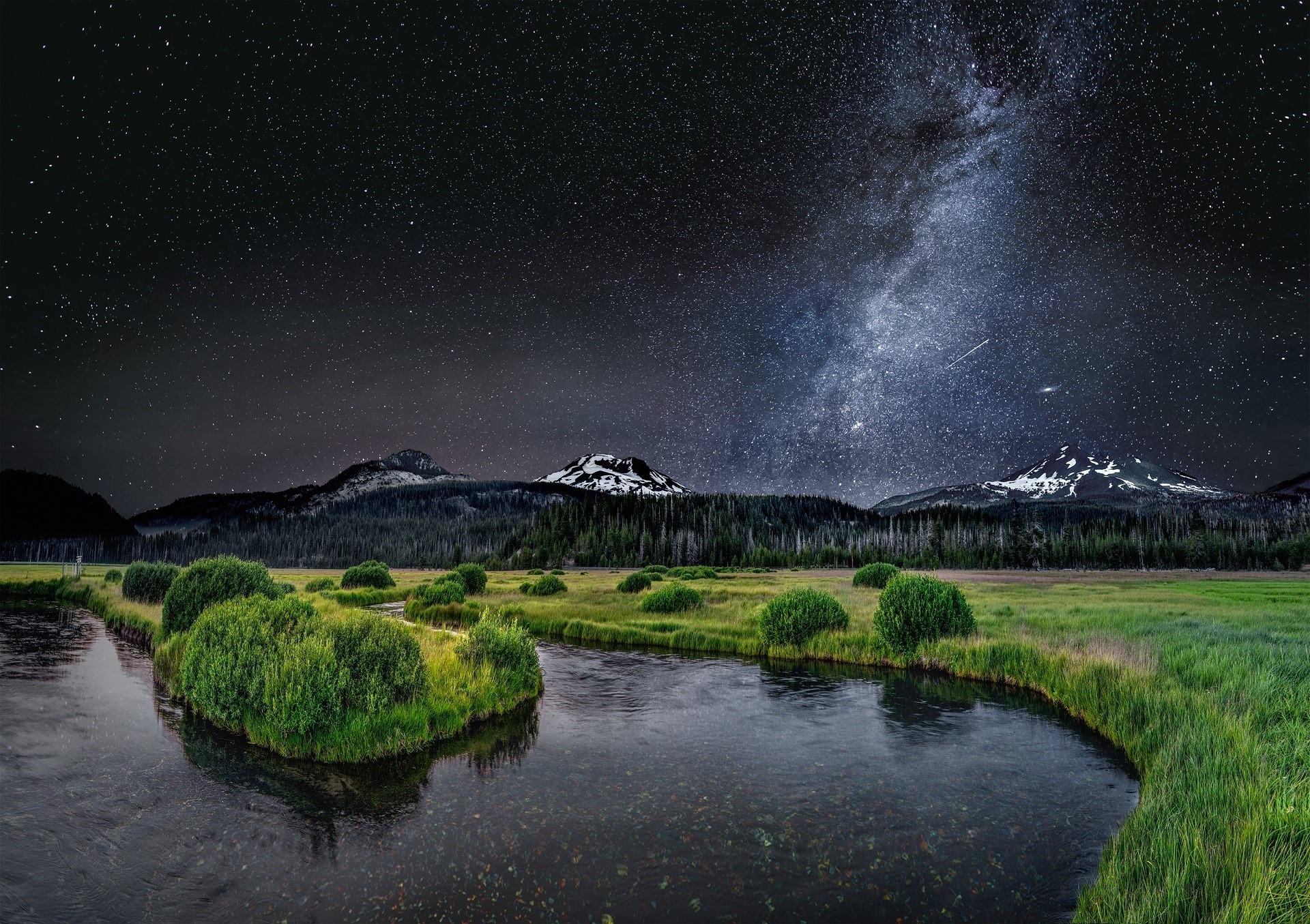 Milky Way over mountains and river at night HD Wallpaper