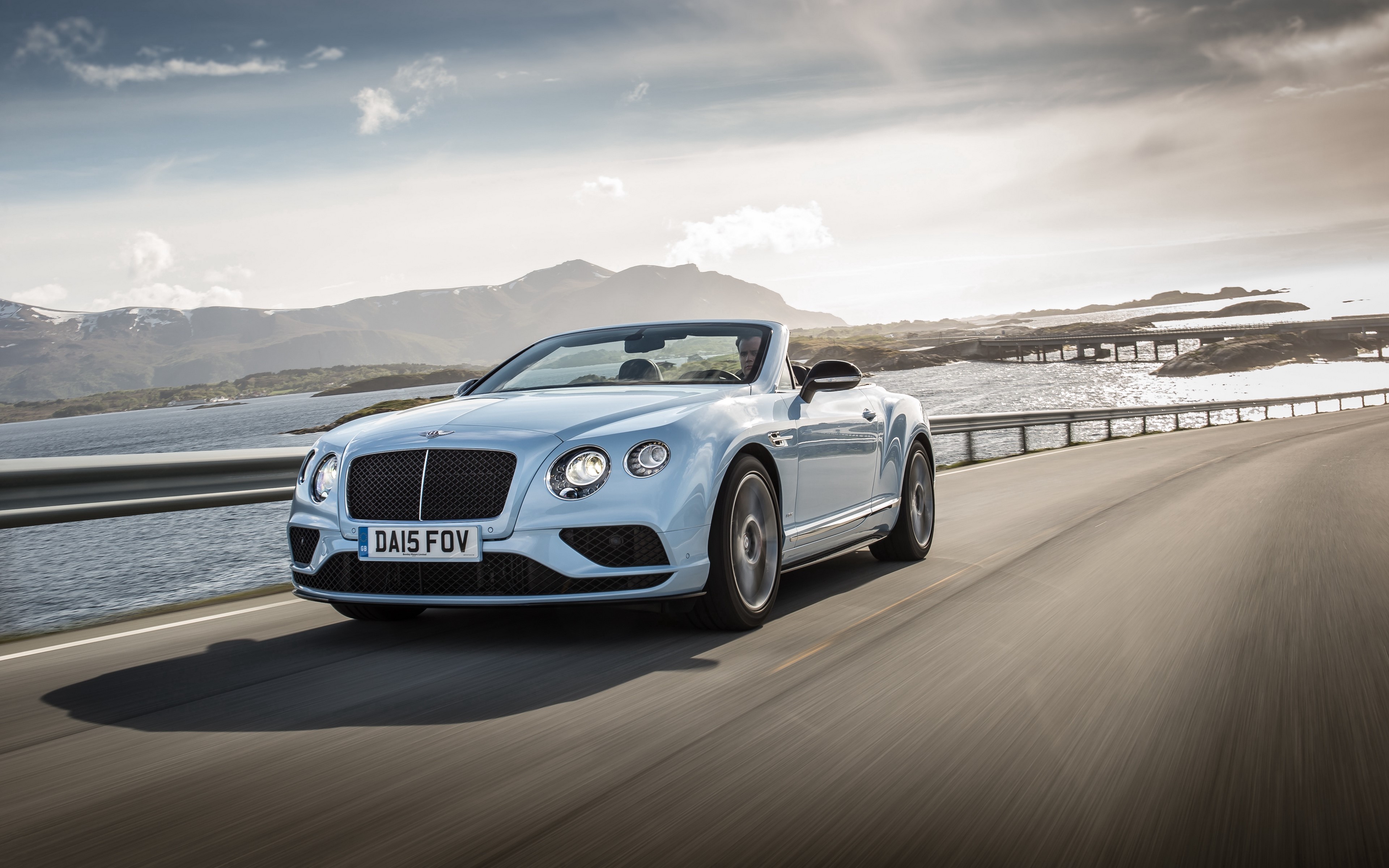 Bentley Continental GT Convertible on a Coastal Road HD Wallpaper
