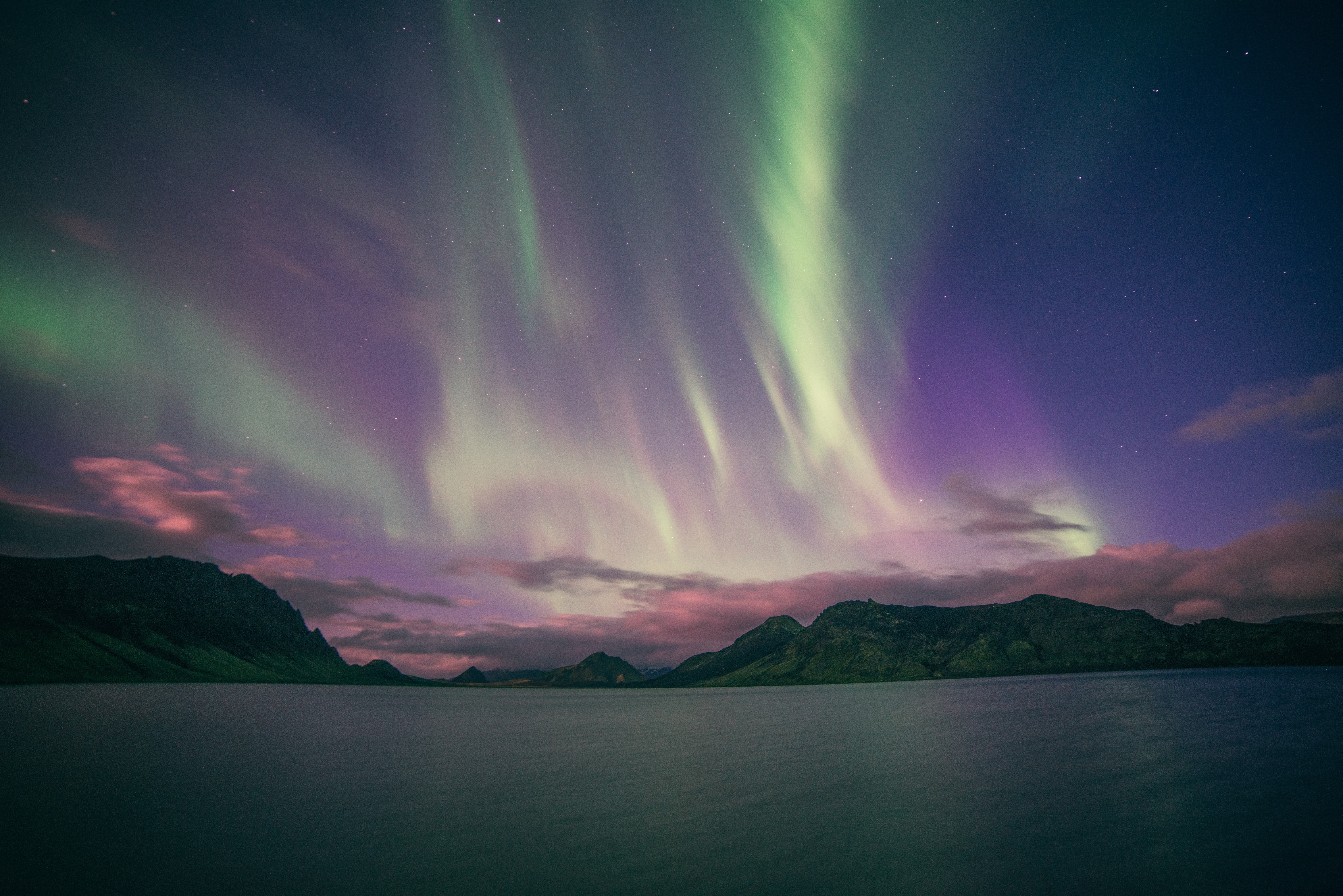 4K Aurorae over Mountains and Water HD Wallpaper
