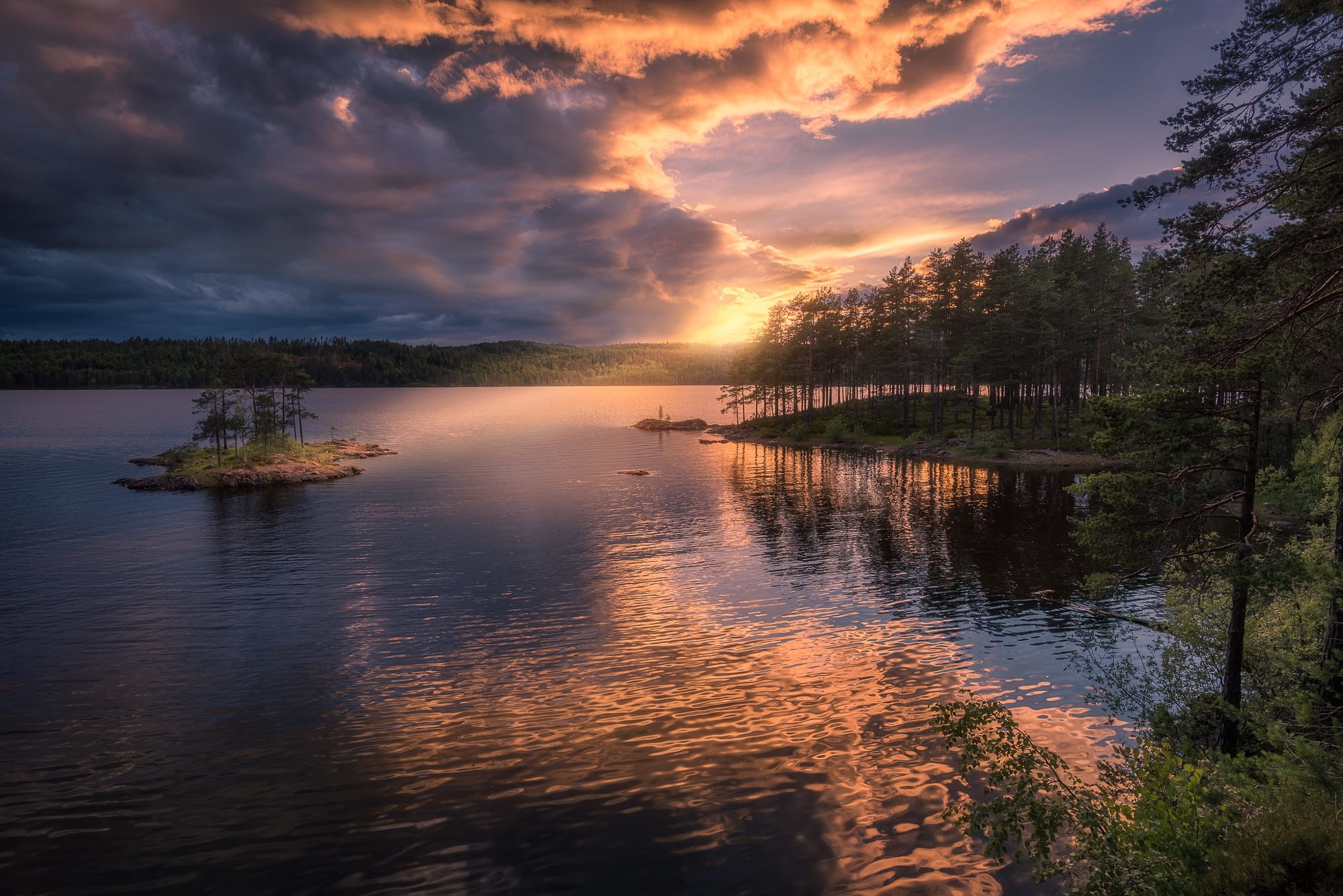 Sunset over a lake with islands and pine trees HD Wallpaper